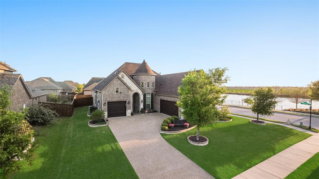 Rare NORTH-facing, beautifully updated ONE-STORY home in Lakes of Prosper with modern finishes, major upgrades, and energy-efficient living. Move-in ready and thoughtfully designed, this home offers comfort, style, and long-term value from day one.
Enjoy soaring ceilings, rich architectural details, and abundant natural light throughout an open-concept layout ideal for everyday living and entertaining. The gourmet kitchen features an oversized farmhouse sink, walk-in corner pantry, and seamless flow into the dining area, breakfast nook, and spacious living room. A private study offers an ideal work-from-home space with added storage.
The luxurious primary suite includes dual vanities, a spa-inspired bath, walk-in shower, bidet, and an oversized walk-in closet. Secondary bedrooms provide flexibility, privacy, and lake views.
Recent upgrades include 5-inch wood shutters, a spacious laundry room with sink and storage, and a full remodel with new flooring and paint completed in Oct. 2025. In Feb. 2026, a brand-new high-impact roof and gutters were installed.
A standout feature is the professionally installed solar system with two Enphase battery backups. This system delivers exceptional energy efficiency, backup power, and long-term savings. The owner has paid no electricity charges for 11 of the last 12 months due to solar production credits, offering predictable and significantly reduced energy costs compared to similar homes.
Relax on the covered patio, perfect for year-round enjoyment. The home is within walking distance of HEB and Chick-fil-A and offers access to resort-style amenities including a semi-private pool, fishing lake, trails, playgrounds, Frontier Park, and top-rated Prosper ISD schools, with easy access to the Dallas North Tollway.
A rare opportunity to own a fully upgraded, energy-efficient, one-owner, one-story home in one of Prosper’s most desirable communities.