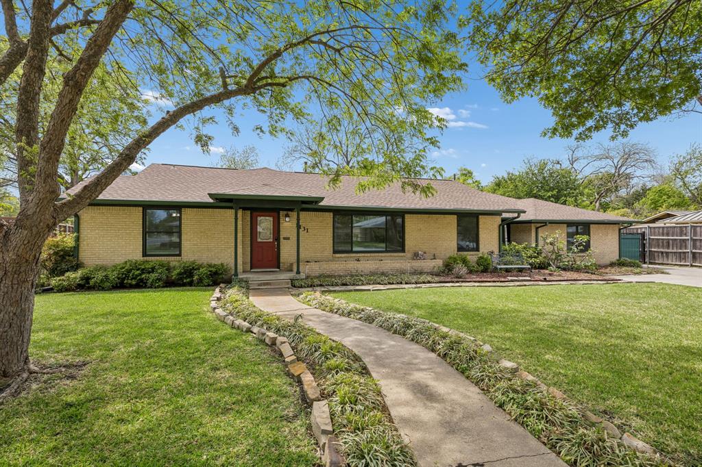 Welcome to this impeccably maintained and expanded mid-century charmer situated on a sprawling interior lot in the highly coveted neighborhood of Lake Park Estates just a few minutes from White Rock Lake. This home has been lovingly cared for by long-term owners and thoughtfully expanded to offer 2,678 square feet of versatile living space. Step inside to find a light and airy atmosphere defined by fresh neutral paint and light-toned original hardwood floors that flow throughout. The traditional formals lead into an expansive heart-of-the-home kitchen featuring 42” wood cabinetry, gas cooking, an island, and casual dining bathed in natural light. The early-2000s expansion transformed this residence adding a primary suite, a true sanctuary featuring a walk-in closet and ensuite bath with a jetted tub-shower, also a family Room which is a cozy gathering space anchored by a corner wood-burning fireplace and custom built-in bookshelves. Versatile bonus spaces include a home office and a mudroom space, plus a large game room with a full-sized laundry closet. The outdoor oasis is a paradise for gardeners and entertainers alike. The large backyard features native perennial landscape beds and a dedicated vegetable garden. Relax on the extended patio under the shade of the gazebo or unwind in the hot tub. Practicality meets luxury with a remote-controlled driveway gate leading to an oversized, truck-sized attached garage, supplemented by two additional storage units. Updates included over time are superior double-hung replacement windows and doors throughout, zoned HVAC systems for seasonal comfort, energy-efficient tankless water heater, recessed lighting, plenty of ceiling fans, and of course the kitchen and 3 full bathrooms. Located within the sought-after Hexter Elementary zone and just minutes from the hiking & biking trails of White Rock Lake, this is a fantastic opportunity to secure a large, move-in-ready home in one of Dallas’s most vibrant neighborhoods.