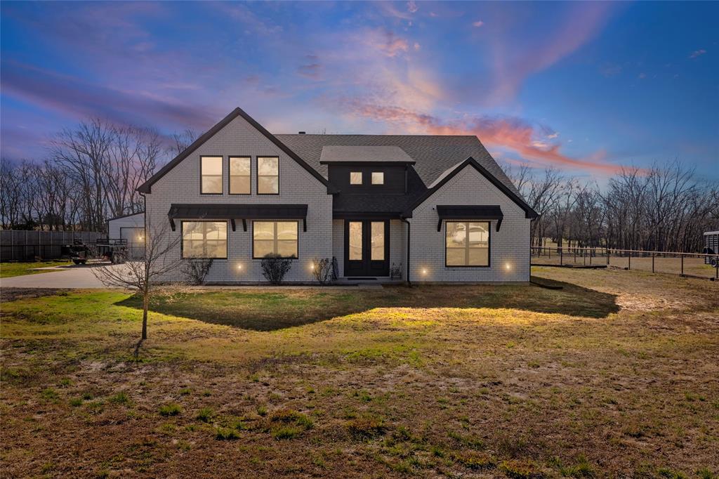 ***MOTIVATED SELLERS - BRING YOUR OFFER!*** Discover the perfect blend of comfort and space in this charming Campbell property. Situated on 1.5 fully fenced acres, this thoughtfully designed 3-bedroom, 2-bath home offers an inviting open floor plan as well as a home office or flex space ideal for both everyday living and entertaining. The living area is anchored by an eye-catching fireplace and beautiful sliding glass doors, while the kitchen impresses with a generous island for casual meals and a dedicated dining space nearby.

The private primary suite is tucked away from the secondary bedrooms and features a well-appointed ensuite with dual vanities, an oversized walk-in closet, and a large walk-in shower. Step outside to enjoy morning coffee and relaxing evenings and take in peaceful views from the expansive 20 x 50 covered patio, complete with recessed lighting and an oversized ceiling fan—perfect for enjoying the outdoors year-round.

A 30 x 30 shop with electricity and exterior lighting provides endless possibilities for hobbies or projects. With space, style, and functionality all in one, this property is a must-see opportunity.