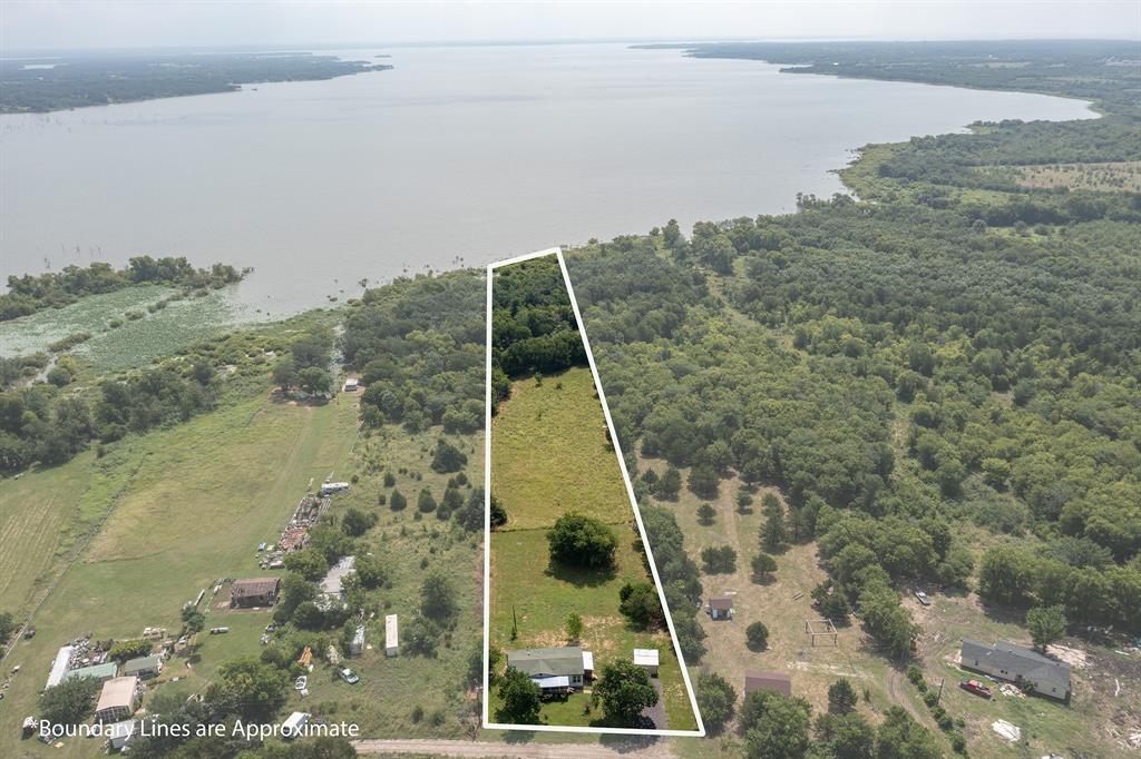 Affordable lake front home! 
Opportunity awaits on Lake Tawakoni! This beautifully remodeled 3-bedroom, 2-bath double-wide mobile home sits on just over ¾ of an acre and backs up to the lake with approximately 150 feet of shoreline frontage.

The home is move-in ready and features new windows, updated kitchen appliances, and numerous interior updates throughout. The spacious layout offers comfortable living with plenty of room for family and guests.

The property is wooded behind the house, providing privacy and a peaceful setting. With some clearing, you’ll have the opportunity to open up potential lake views and create the outdoor space you’ve always envisioned. The leaseback area offers excellent potential for a future waterfront retreat, fishing area, or recreational space.

Whether you’re looking for a primary residence, weekend getaway, or investment opportunity, this property combines a fully updated home with the rare chance to customize and enhance your own piece of Lake Tawakoni shoreline.

Come see the possibilities and make this lakeside property your own!