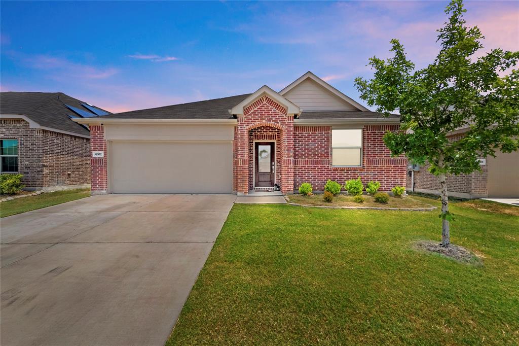 Welcome home! This like-new residence is eagerly awaiting your arrival. Boasting 4 generously sized bedrooms and 2 bathrooms, this home features an open-concept design that seamlessly blends the living, dining, and kitchen areas—ideal for hosting family gatherings and enjoying cozy movie nights. Every detail of this home has been meticulously maintained by the homeowners, who have also added an extended patio. Picture yourself creating unforgettable memories while BBQing with loved ones in your beautifully landscaped backyard. Situated in the highly sought-after Eagle Mountain ISD, this home is just a short walk from the local middle school, making school commutes a breeze. Its central location offers quick access to major highways, a variety of restaurants, and excellent shopping options, ensuring convenience and an active lifestyle. This is more than just a house; it’s a place where you can create a lifetime of memories (home)