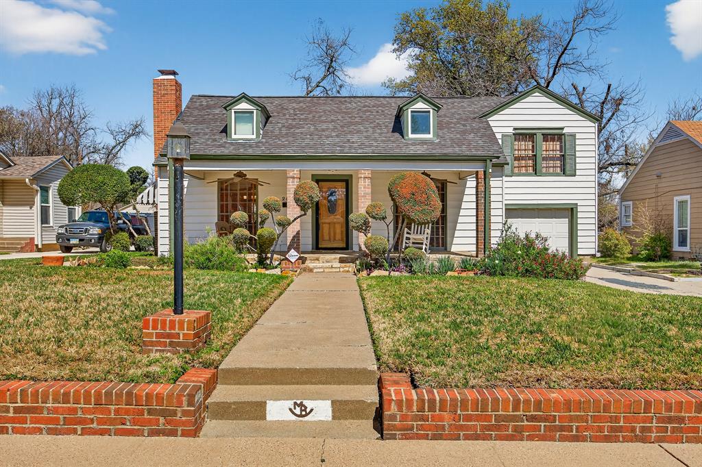 A wide front porch is the place you can rest and greet your new Oakhurst neighbors.  This classic feature is a hallmark of vintage home design and is appropriate for this classic, friendly neighborhood.  Inside you will find well maintained, original hardwood floors and knotty pine.  Bedrooms are arrayed in a split-level arrangement. The top level is a large primary with ensuite bath in an alcove.  The downstairs bedroom is well suited as a home office.  Double driveway entry provides abundant parking and connects through a gate to the ample fenced back yard.  There you can enjoy the wooden deck as well as a brick patio and walkway - a perfect setting for backyard projects or summertime grilling.  The beautifully maintained grounds frame this classic home.  Come see this home and see what makes Oakhurst so appealing.