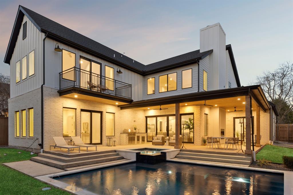 The first of an architectural duo by Strange and Sons development. Introducing The Bermuda Collection - a limited pairing of newly built East Dallas residences designed with elevated finishes, thoughtful layouts and seamless indoor-outdoor living. Each with their own unique flair, 1811 Bermuda showcases five bedrooms, including a junior primary suite and a secluded main primary retreat with stunning views. The primary suite boasts 20-foot vaulted ceilings and a spa-inspired bath complete with fluted white oak cabinetry, Carrara marble, a vessel tub, and a spacious dual-head rainfall shower.The gourmet kitchen is a true showpiece, featuring custom cabinetry, Aspen White Dolomite quartz countertops, a Bertazzoni range, a 60-inch built-in refrigerator, and a hand-crafted hood vent. A white oak wet bar with backlit shelving adds warmth and sophistication, while the walk-in pantry offers exceptional functionality with an additional dishwasher and secondary refrigerator. oaring ceilings, walls of glass overlooking the resort-style pool and spa, and a light-filled great room anchored by a striking stone fireplace. The chef's kitchen impresses with professional-grade appliances, custom cabinetry, and a statement island ideal for entertaining and everyday living. Sliding doors extend the living space to a covered patio and fully outfitted outdoor kitchen, creating a true year-round retreat. Enjoy ultimate privacy in your backyard oasis, with no neighboring homes overlooking the pool and hot tub, complemented by an outdoor living area and fully equipped outdoor kitchen with easy access to the pool bath. Additional highlights include a dedicated office and a dining room adorned with imported French wallpaper. Built with exceptional quality and attention to detail, the home features CAT-6 pre-wiring, foam insulation, tankless water heaters, a post-tension slab foundation, and a 1-2-10 Builder’s Warranty.