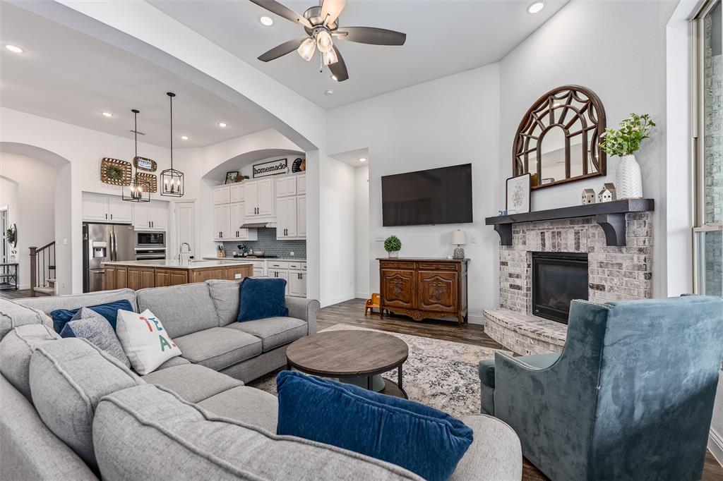 This is a true gem in Liberty! This Highland Home beauty is ready for you! The tandem garage is 41 feet deep to park a boat or pickup truck or storage, plus has epoxy floors. The beautiful wood look tile in the common spaces is durable and easy to take care of. The double dishwashers in the island make keeping up with dishes a breeze. The over sized pantry, island, and kitchen have TONS of storage. Dual Primaries make for a great multi-gen option. 3 bedrooms downstairs, all with an ensuite bath. The large office has built in cabinets and floating shelves. The media room, powder room and laundry round out the downstairs. Upstairs you'll find a loft-game room, full bath, and bedroom. 3 large coat closets make for great storage, plus outlets in multiple for charging. All rooms have at least 1 USB in the outlets. The large patio and back yard make for great entertaining, could add a pool, or put in a play set. Come find your new home in time for summer fun! 
Still under builder foundation warranty. See floor plan with approx measurements in photos. 
Financing special with PenFed Credit Union including waiving appraisal fee & more!