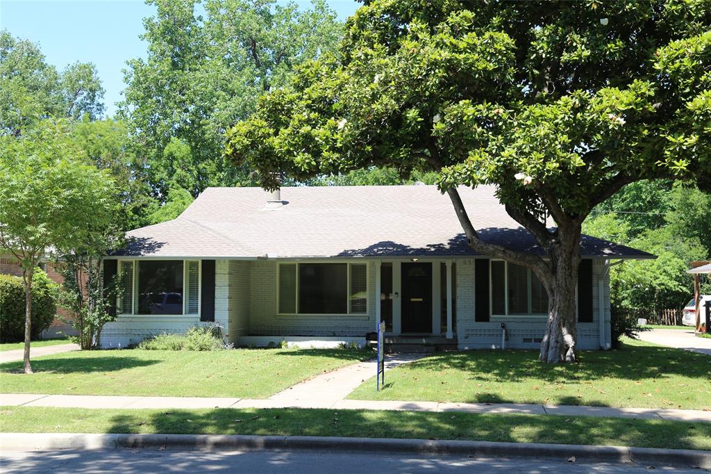 Nestled in the highly coveted Ridgewood Park neighborhood, this gorgeous traditional ranch-style residence offers a seamless blend of classic character and modern sophistication. The interior is defined by an inviting atmosphere, highlighted by vaulted ceilings in the living room and rich hardwood flooring throughout. The chef-inspired kitchen serves as the heart of the home, featuring granite countertops, a gas cooktop, and a breakfast bar that connects beautifully to the dining spaces. With two distinct living areas, each anchored by its own cozy fireplace. The home provides ample room for both formal entertaining and relaxed daily living.
The floor plan is designed for maximum versatility. Elegant plantation shutters are featured throughout, providing a refined touch and excellent light control. This flexible layout easily adapts to your specific needs, whether you require a guest suite, a dedicated home office, or a media room. Every detail has been thoughtfully envisioned to balance modern functionality with timeless appeal, creating a move-in-ready environment for the discerning buyer.
Outdoor living is elevated to a true retreat in the private backyard oasis, where a large patio provides a shaded sanctuary. This space overlooks a sparkling, ‘Texas-sized’ pool perfect for hosting summer gatherings or enjoying quiet evenings. Beyond the property line, the location offers unparalleled access to the best of Dallas; residents enjoy close proximity to the scenic trails of White Rock Lake, the Dallas Arboretum, and the Southern Methodist University campus. Situated near highly regarded schools and premier shopping and dining, this home represents a rare opportunity to join the vibrant Ridgewood Park community.