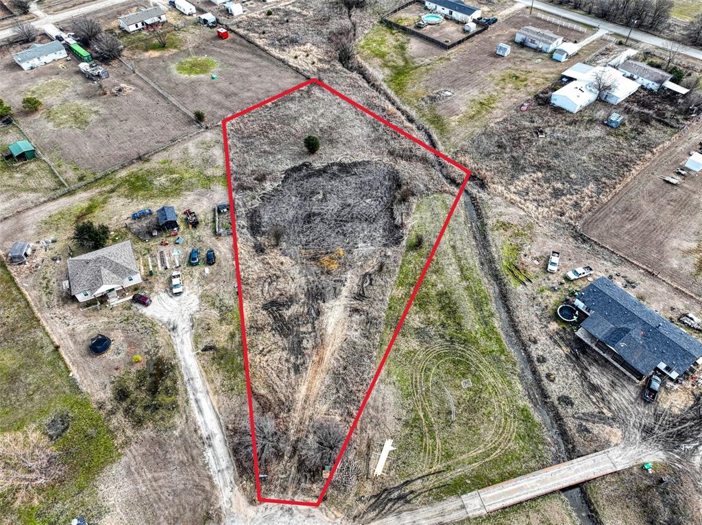 Build your vision on this vacant residential lot located at 3099 Shanda Ct, Kaufman, TX 75142. Situated on a quiet cul-de-sac, this property offers a peaceful setting with the convenience of nearby schools, shopping, dining, and easy access to major highways for commuting. The lot provides a great opportunity for a custom single-family home or long-term investment, subject to city zoning and building requirements. Utilities are available nearby (buyer to verify), and the surrounding area features established homes with continued growth and development. Ideal for builders, investors, or end users looking to create a home in a growing Kaufman community.