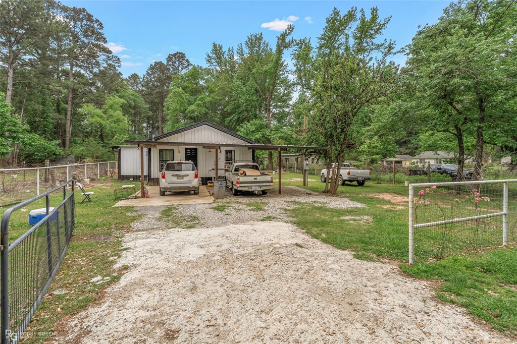 143 New Bethel Booker Rd, Benton, LA — Opportunity is knocking! This charming country cottage is full of potential and ready for its next chapter. Featuring 2 bedrooms, 2 bathrooms, with the option to easily convert into a 3-bedroom by adding a closet, this property offers flexibility for homeowners and investors alike.



Enjoy the inviting front carport, spacious wooden deck, and outdoor kitchen area—perfect for entertaining or relaxing in the peaceful country setting. Out back, you’ll find a workshop for hobbies, storage, or projects, along with a fenced area ideal for horses, goats, or any animals you’d like to have.



Located just off Highway 3, this home offers convenience while still giving you that quiet, rural feel. Situated in a highly desirable school district, this property would make an excellent rental, fixer-upper, or flip opportunity with strong future potential as growth and new jobs continue coming to the area.



Whether you’re looking for your next investment, mini homestead, or a place to make your own, this one is worth a look.