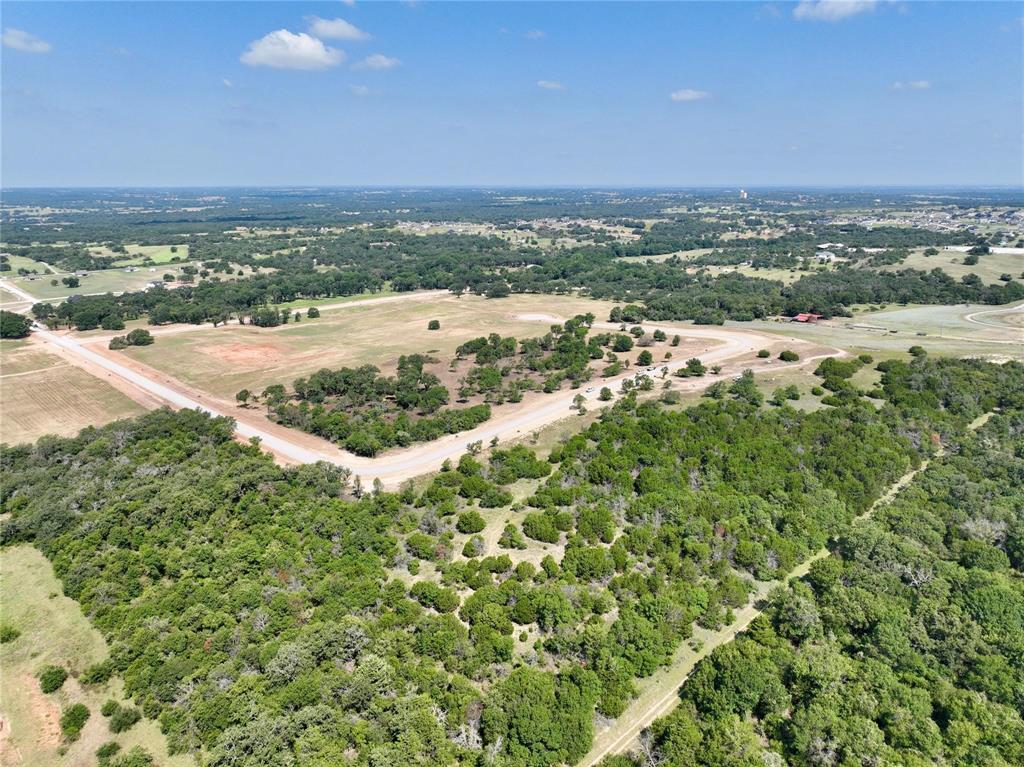 Discover the perfect blend of privacy, beauty, and convenience on this 1.979-acre homesite just minutes from Springtown and only 25 minutes to Weatherford, located within Weatherford ISD. This pie-shaped lot offers exceptional privacy with rolling terrain, scenic views, and mature trees that create a natural, peaceful backdrop for your future home.

Enjoy the freedom to design your custom home with no HOA, deed restrictions and the flexibility to bring your vision to life. One horse or cow per lot is allowed, making it ideal for small-scale country living at The Reserve at Taylor Ranch.

Modern conveniences are already in place, including underground electricity, NextLink Fiber Optic, and no water bills. With its rolling topography, beautiful views, pie shaped lot and quiet setting, this property offers the perfect canvas for your dream home.

Minimum home size: 1,700 sq ft. No Barndominiums.