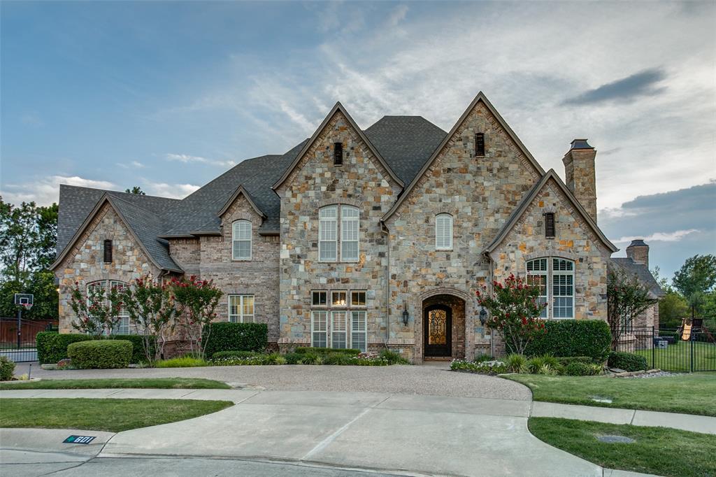 Welcome home to this Stunning Southlake Estate nestled into the heart of our community. Tucked away on a quiet cul-de-sac this custom executive home has a great family floor plan, impressive designer finishes & luxurious charm. The warm Foyer welcomes guests with lovely staircase and gracious Dining room w separate Bar. The newly updated Kitchen is open to the Hearth and Family rooms with tons of natural light, wood floors & gorgeous arched wood beams. Well-appointed Media room is on the 1st floor along + large mud area, back stairway, Private Primary Bedroom retreat w Exercise and sep Guest Suite. Executive Study is on the mezzanine level and boasts beautiful design with wainscoting & cozy fireplace. Upstairs features a large Game room with Bar, Flex-Craft room and 3 bedrooms with en-suite baths. Step out to backyard oasis to enjoy a lovely covered living area, grill area, large pool with grotto, fire pit for gatherings + large yard for play. Wow, what a wonderful place to call home!