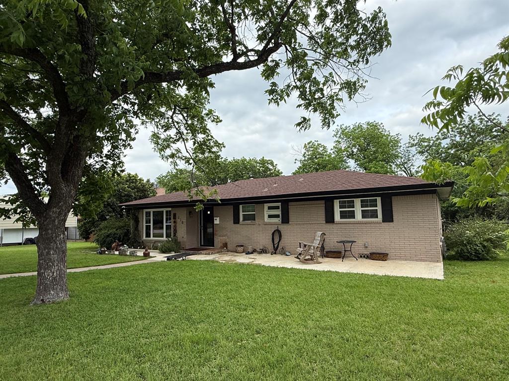 This spacious home sits on a large corner lot in the heart of Clifton.  Many updates have already been completed.  It currently features five bedrooms and an updated full bathroom. The master bathroom includes a vanity and toilet but requires a shower installation to complete a second full bath. There is also a half bathroom adjacent to one of the guest bedrooms. The open-concept living and dining area has crown molding, recessed lighting and is enhanced by a wood-burning fireplace. Updated vinyl windows and lots of natural light.  A separate laundry room with pantry is located off the kitchen. With plenty of space throughout, this home is ideal for a growing family or for entertaining guests. Outdoors, you’ll find a fenced backyard, covered patio, outside shower and a detached garage. An additional RV-sized carport provides extra covered parking. The roof is approximately five years old, and the property features good tree coverage—ready for its next owners to enjoy!