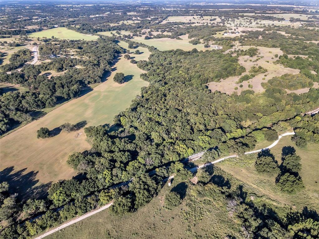 100+ acres in beautiful Wise County! Endless possibilities with this piece of property. Lots of trees, open ranges, for crafting into a home site and grazing pastures for livestock. Located south of Decatur and a short distance from 287, this site provides easy access to the quiet towns of Wise County. There are restrictions.
