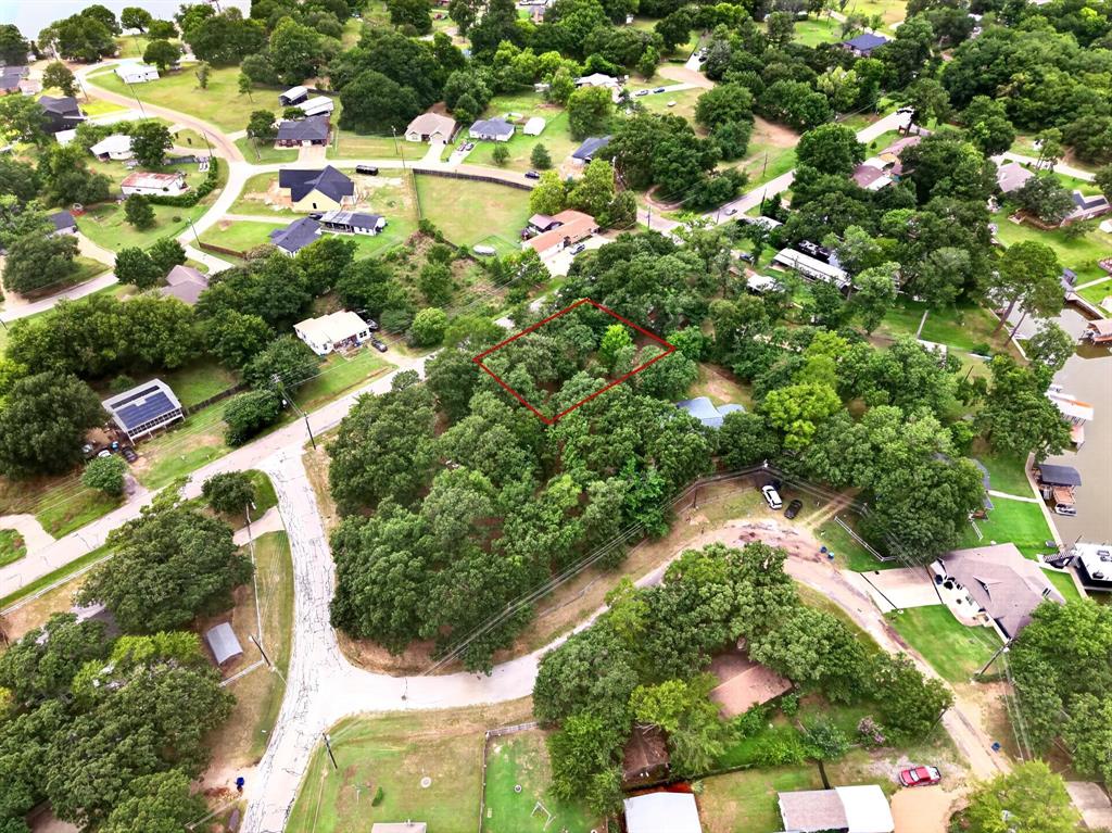 Build your dream home in the established community of Holiday Club Estates! This ready-to-build lot offers a convenient location near shopping, grocery stores, restaurants, schools, and churches, making everyday living a breeze. Property owners have the opportunity t
o enjoy the Holiday Club Estates boat launch and dock area through membership in the community association. Looking for additional space? The adjacent Lot 48R2 is also available for purchase, providing even more possibilities for your custom home, outdoor living, or extra privacy. Come experience lake-area living with room to create the lifestyle you've been dreaming of! Buyers and buyers agents are responsible to confirm all information. Replat and T-47 available.