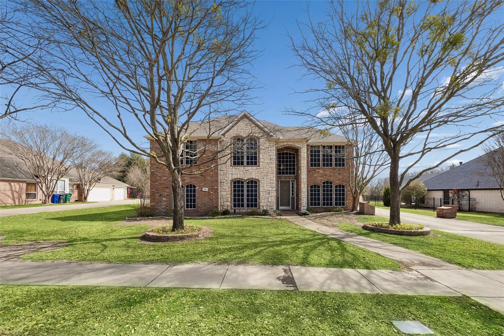Set on nearly half an acre, this stunning estate offers space, privacy, and an ideal location near the new Lyon Elementary and Heath High School. Thoughtfully designed and beautifully maintained, the home features rich wood floors, a private study, formal dining, and multiple living and gathering areas perfect for everyday living and entertaining. The kitchen is a true centerpiece with granite countertops, stainless steel appliances, double ovens, a walk-in pantry, and a butler’s pantry area—ideal for hosting and organization. The split primary retreat provides a peaceful escape with room for a sitting area, two walk-in closets, dual vanities, a garden tub, and a separate shower. Upstairs, you’ll find a spacious game room along with four generously sized bedrooms and two full baths, offering flexibility for guests, hobbies, or work-from-home needs. Out back, enjoy a private oasis featuring a sparkling saltwater pool with water feature, tranquil greenbelt views, and exceptional privacy—perfect for relaxing or entertaining outdoors. A three-car garage offers abundant storage and convenience, complete with an additional half bath. This exceptional property blends comfort, functionality, and outdoor enjoyment in a highly desirable setting. 3D tour available online.