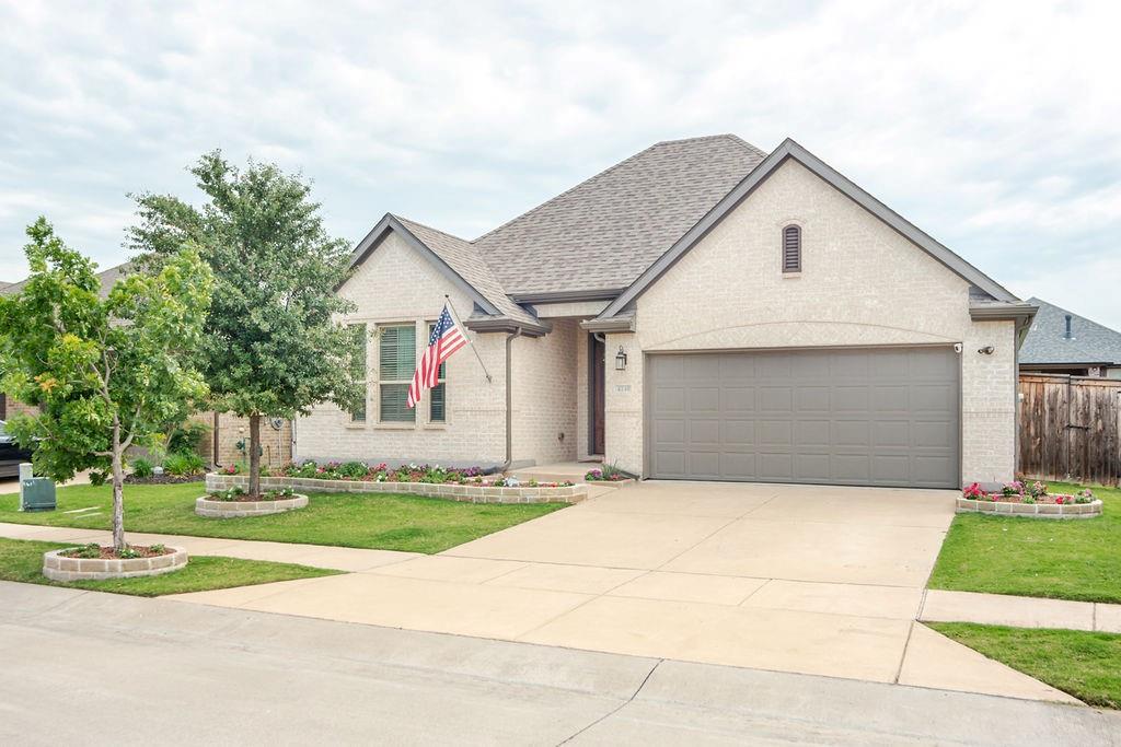At the intersection of charm & practicality sits 4140 Lightcreek Lane, inside Celina's premier amenity loaded subdivision, Light Farms! This Prosper ISD zoned 4 bed, 3 bath gem contains over $40k in upgrades, an open floor plan allowing for lots of natural light and living areas that promote family cohesiveness. Upon entering you're led down the main foyer to the spacious living room and cozy fireplace that flow seamlessly into the kitchen you will find an oversized island providing additional eating space and plenty of storage. The adjacent dining areas also allows for entertaining or everyday meals. The bonus room found off the living area can function as either an office or craft room depending on your needs. The primary suite is a true retreat, with dual vanities, large shower as well as garden tub. Pass through it to arrive at your oversized walk-in closet with plenty of room for all wardrobe needs. The other three bedrooms provide enough space for family and guests. The dedicated laundry room hosts side-by-side washer and dryer along with generous storage, with a mudroom, drop-zone near the garage. Outside, enjoy a spacious, full-fenced backyard, and your covered patio is already wired for flatscreen TV power! The setup is ideal for summer backyard BBQ entertaining, playtime or just relaxing. Overall, this beautiful home is ready for you to move in today and enjoy the neighborhood amenities of which Light Farms has plenty! Just a 2 minute walk to the closest pool! There are multiple community pools, clubhouse with gym, several on-site restaurants,bar, on-site elementary school, and a man-made lake with a beach! Enjoy swimming, fishing, walking, biking, dining and playing in the golf cart friendly master planned community of Light Farms! Just down the road you will find a brand-new HEB Grocery store and shopping center with multiple restaurants and more on the way. All very close to the Dallas North Tollway access enjoyed by so many! Come see this home today!!