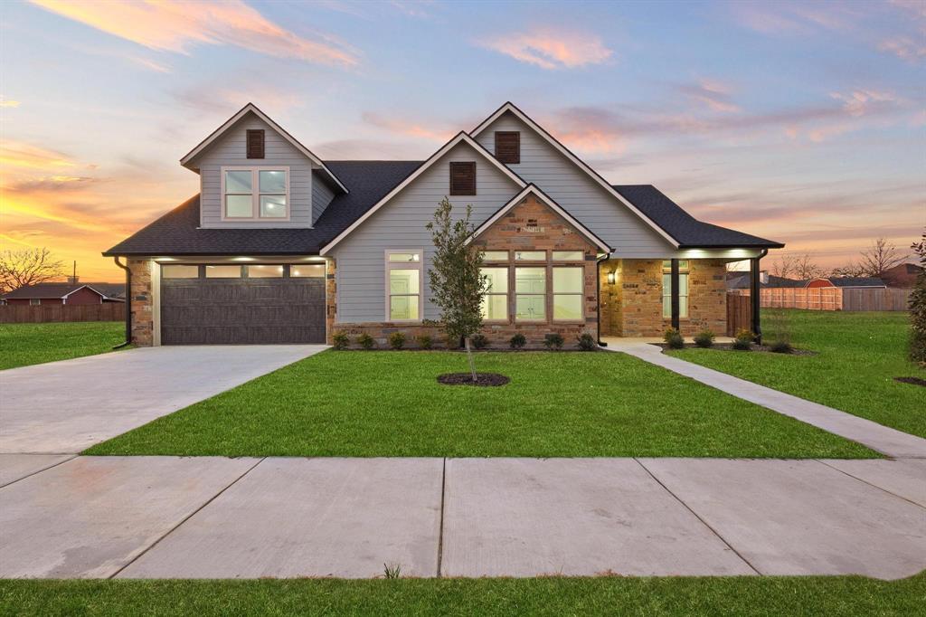Welcome home. 512 Bandera Drive is where a true custom home builder brings his craftsmanship to new construction. Built by Akins Construction Inc, a builder known for primarily custom homes, this property showcases a level of quality, materials, and attention to detail rarely found in typical new builds. The exterior features cement board siding with premium exterior paint, beautifully accented by stonework, architectural rooflines, and a cedar privacy fence. An engineered foundation with soil testing for expansion provides long-term peace of mind, while a full sprinkler system is already in place. The lawn features a thick, premium grass.  Inside, the home offers 4 bedrooms and 3.5 bathrooms, along with a thoughtfully designed layout that blends function and comfort. The main living area features vaulted ceilings, exposed wood beams, and expansive windows that fill the space with natural light. The open-concept design flows seamlessly into the kitchen and dining areas, ideal for everyday living and entertaining. A dedicated office with a built-in desk adds flexibility for work or study. Upstairs, you’ll find additional living space, perfect for a game room or second lounge, along with one of the full bathrooms and a bedroom with a walk-in-closet, making it ideal for guests or multi-generational living.. The home is beautifully trimmed throughout with one-of-a-kind crown stops for the transitions in the elevations, adding a custom finish rarely seen in new construction. Additional features include soft-close, stain-grade white hard maple cabinetry in the kitchen, bathrooms, laundry room, and coffee nook; custom-built closets; motion-sensor closets; a plumbing manifold system; open-cell spray foam insulation in the roof and exterior walls; and an additional attic sub-panel with room for future expansion. If this home isn’t the perfect fit, Akins Construction Inc offers the ability to build your dream home with the same quality and true craftsmanship showcased here.
