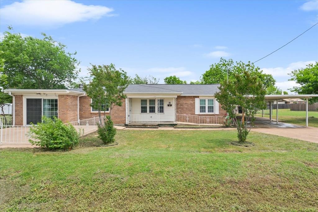 Welcome to your beautifully renovated home on Garfield Street! Sitting on a double lot, this charming 1970s build has been thoughtfully updated with new electrical and plumbing, foundation leveling, a new HVAC system, and a working fireplace. The south-facing layout fills the home with natural light. Inside, the open-concept kitchen features stainless steel appliances, a large island, quartz countertops, white subway tile backsplash, and elegant lighting throughout. The master suite now includes a spacious walk-in closet and a luxury bathroom with a custom shower, new tub, and stylish vanity. A brand-new bedroom and bathroom have been added, and both guest baths have been fully remodeled to match the master’s luxury finishes. Additional updates include new French doors in the den, a restored fireplace, upgraded laundry hookups, and new luxury vinyl plank flooring throughout. The French doors open to a covered patio—perfect for relaxing or entertaining. SELLER CONTRIBUTING TO PAY FOR A FULL POINT BUY DOWN IF LENDER APPROVES!