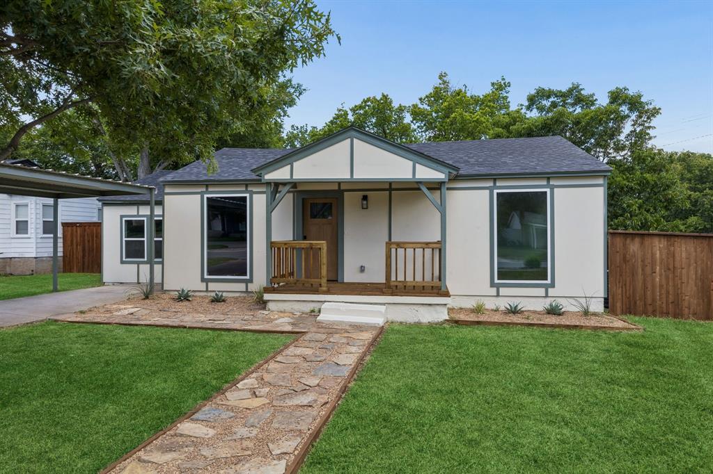 Every inch of this charming Oak Cliff home has been thoughtfully renovated, blending timeless character with designer finishes, quality craftsmanship, and modern functionality. Situated on a spacious corner lot at the end of a beautiful, tree-lined street, this 4-bedroom, 2-bath home offers added privacy while remaining just minutes from Bishop Arts and all that Oak Cliff has to offer. Rich hardwood floors run throughout, complemented by designer lighting, abundant natural light, and carefully curated finishes that create a warm, elevated feel. The stunning kitchen features natural stone countertops, premium brand-new appliances, custom cabinetry, and an open-concept layout that’s perfect for everyday living and entertaining. The flexible fourth bedroom offers the ideal space for a home office, guest room, or playroom, while the dedicated utility room adds everyday convenience. The spacious primary suite includes a cozy nook perfect for a coffee bar, reading corner, or dresser, along with a beautifully designed ensuite featuring statement tile, an expansive marble vanity, and a generous walk-in closet. Step outside to enjoy a welcoming front porch, covered carport with driveway parking, and an incredible backyard shaded by mature trees. The fully fenced yard offers plenty of room to play, entertain, or unwind, complete with a spacious outdoor living area and a one-of-a-kind vintage brick grill and oven that adds even more character to the property. Whether you’re looking for a stylish place to call home or a turnkey investment in one of Oak Cliff’s strongest rental markets, this thoughtfully renovated home offers exceptional style, flexibility, and location.