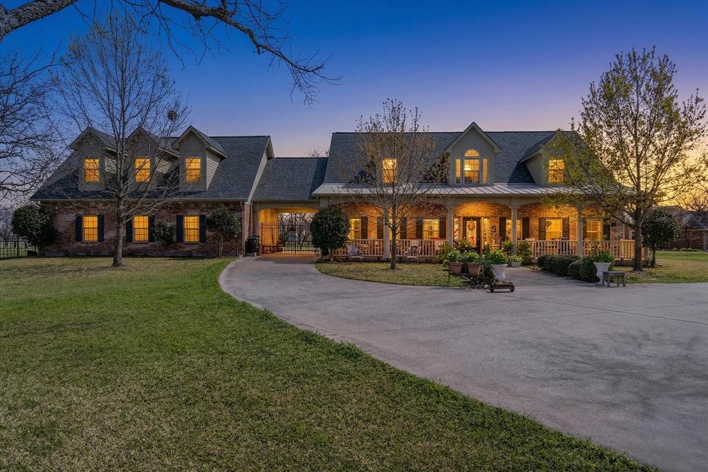 Price Reduced on this Amazing Custom Home-1.27 acre estate with soaring ceilings, sunroom fireplace, guest suite terrace, and 2025 updates.

Listing Description
Located on 1.27 acres in the gated golf community of Pecan Plantation, this custom home combines generous space, warm country character, and impressive functionality inside and out.

Built in 2007, the home showcases 20-foot vaulted ceilings, custom built-ins, and multiple living areas including a formal dining room, private office or study, and an enclosed sunroom with a striking floor-to-ceiling brick wood-burning fireplace. Thoughtful design continues throughout with abundant storage, including convenient attic-access closets and built-in storage features that make the home exceptionally practical.

The chef’s kitchen is designed for entertaining and everyday living with granite countertops, an oversized island with prep sink, six-burner cooktop, double wall ovens, walk-in pantry, butler’s pantry, and a dedicated baking station, plus extensive cabinetry.

The private primary suite offers built-in bookcases, a wall-length window seat with hidden storage, an oversized walk-in closet, dual vanities, custom cabinetry, and an antique clawfoot soaking tub.

A versatile bonus suite above the garage with full bath and private terrace provides ideal space for guests, extended family, or a game or media room, with access from both the home and the garage.

Outside, enjoy mature producing pecan trees, expansive usable grounds with room for a pool, a welcoming front porch with swing, and a gated rear-entry drive to a deep three car garage with additional paved space for recreation or sport. Conveniently located just steps from the Nutcracker Golf Club and driving range.

Recent major updates include:
• New roof (2025)
• Exterior paint (2025)
• Tankless water heater (2021)
• New HVAC systems (2024)
• New wrought iron fence (2025)

Buyer and buyer’s agent to verify all information