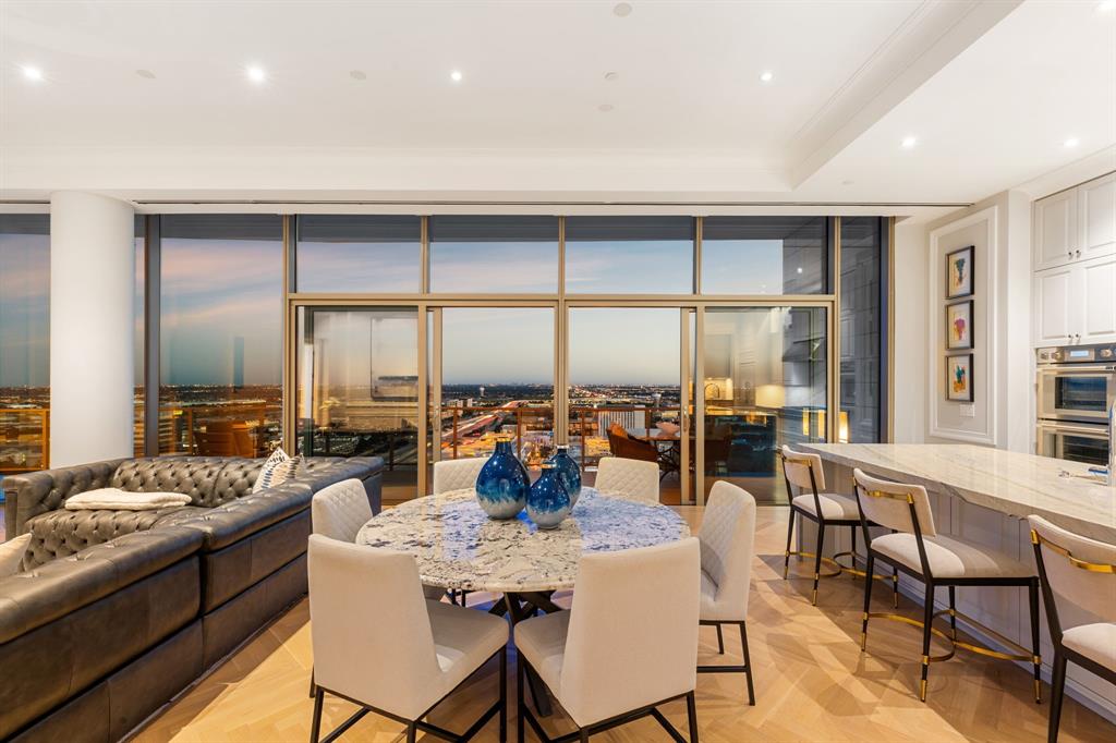 The crown jewel of Windrose Tower is on the market for the first time! Owner purchased this one-of-a-kind penthouse from the master developer of Legacy West- the only unit built 100% custom. No expense spared in ultra-luxury finish out: custom Malerba closets from Italy, Control4 Araknis smart home, 4 commercial grade HVAC units, plaster crown molding, blackout system in primary bedroom, Kallista tub & sinks with Rohl faucets, primary bath & shower is lined with Carrera slab marble walls & molding. Solid white oak floors & 12 ft ceilings provide an elevated sense of luxury. 10.5 ft waterfall kitchen island finished with rare Brazilian granite brought into unit during construction of Windrose Tower to avoid a seam. Open kitchen & second service kitchen offers custom cabinetry & Thermador appliances including 2 built-in refrigerators, 2 dishwashers & wine cooler. Expansive balcony with 2 fireplaces provides views of Legacy West & Dallas. Ultra-luxury shopping & dining within footsteps.