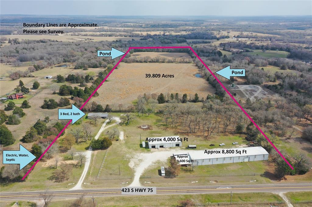 This property is a powerhouse for anyone looking to combine a high-visibility commercial enterprise with residential living or rental income. Its location on Highway 75, high-visibility corridor between Fairfield & Dew, ensures constant exposure, while the nearly 40 acres provides immense privacy and room to expand. Primary Shop: A massive 10,400 total sq. ft. under roof,  8,800 sq. ft. shop featuring a fully integrated additional 1,600 sq. ft. office suite. The office area is climate-controlled & includes a dedicated breakroom plus a full bathroom with a shower—ideal for long shifts or an on-site manager.  It could also be used as a retail showroom area. Secondary Shop: A 4,000 sq. ft. workshop equipped with its own private office and half-bath. This building features a functional loft, perfect for inventory or parts storage to keep the shop floor clear! Designed for efficiency, the commercial entrance is separate from the residential drive, allowing for seamless heavy equipment movement without disturbing the home site. Includes a well-maintained 3-bed, 2-bath mobile home with a covered front porch and attached carport. A second ready-to-go site with water, electric, and septic already in place for an additional home or office.  All of this & a strategic Central Location with easy access to I-45 about midway between Dallas & Houston.