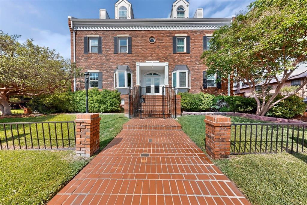 Top-floor condo in the heart of Oak Lawn offering a highly flexible layout with dual primaries, amazing natural light, TONS of thoughtful updates & a lower HOA! The current owners have spent the last year totally transforming this space and are only moving due to a job relocation. Major updates (2025) include new hardwood floors (replacing all laminate & carpet), fully repainted interior, gallery wall & staircase wainscoting, Google Nest & refreshed upstairs primary bath. Gorgeous living room features a wood-burning fireplace with an updated hearth and opens to a charming private balcony. Kitchen is equipped with sturdy quartz counters (+built-in cutting board countertop!), a farm sink & upgraded pendant lighting. Downstairs bedroom is perfect as private office space, second living room or as a second primary, complete with an ensuite bath & large walk-in closet. Stunning primary bedroom upstairs featuring a window seat, vaulted ceilings & a massive walk-in closet. Full bath remodeled with new Beadboard paneling & vanity mirrors, plus a second walk-in closet. So much storage throughout! The unit also comes with assigned garage space (+a new garage remote) for enclosed parking, with security gates & private entry to the complex. Located in a fantastic area walking distance to Eatzi's, La La Land & the Katy Trail, minutes to scenic Turtle Creek parks & trails, Oak Lawn night life & everything else Uptown Dallas has to offer!