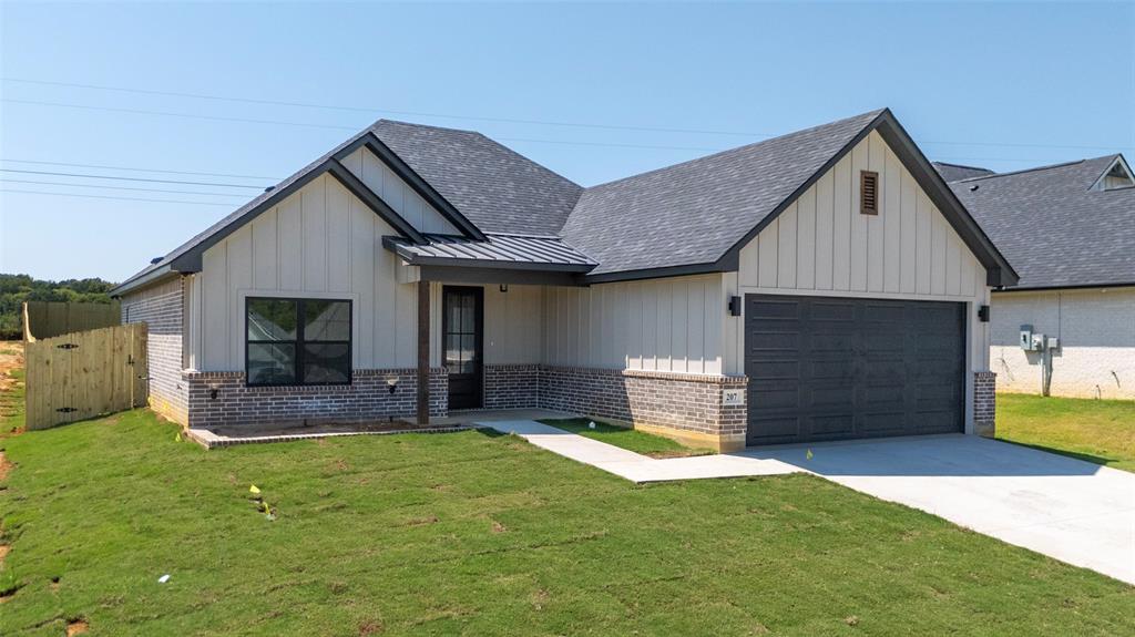 Welcome to 207 Sides, a stunning new construction home located in the desirable Meadow East subdivision within sought-after Bullard ISD. This thoughtfully designed 4-bedroom, 2-bathroom, 2-car garage residence perfectly blends comfort, functionality, and modern elegance. Step inside and you are greeted by a spacious open-concept floor plan where the living, dining, and kitchen areas flow seamlessly together, creating the ideal space for both everyday living and entertaining. The living room is anchored by a beautifully centered fireplace with custom built-in cabinets and floating shelves that frame the space with style and warmth. The kitchen is a true showstopper, featuring sleek cabinetry with shelving extending all the way to the ceiling providing not only extra storage, but also a designer touch that elevates the entire room. The private owner’s suite offers a serene retreat with a large walk-in closet and a spa-like ensuite bathroom designed for relaxation. There are additional bedrooms are generously sized, each offering spacious closets and flexibility to serve as guest rooms, office space, or playrooms. Enjoy the outdoors on the oversized back patio, perfect for grilling, gathering, or simply unwinding at the end of the day. The fenced and freshly sodded backyard provides plenty of room for play, pets, or gardening which offers a true extension of your living space. With its modern features, open layout, and location in a welcoming neighborhood close to schools and amenities, 207 Sides is more than just a house, it’s the perfect place to call home