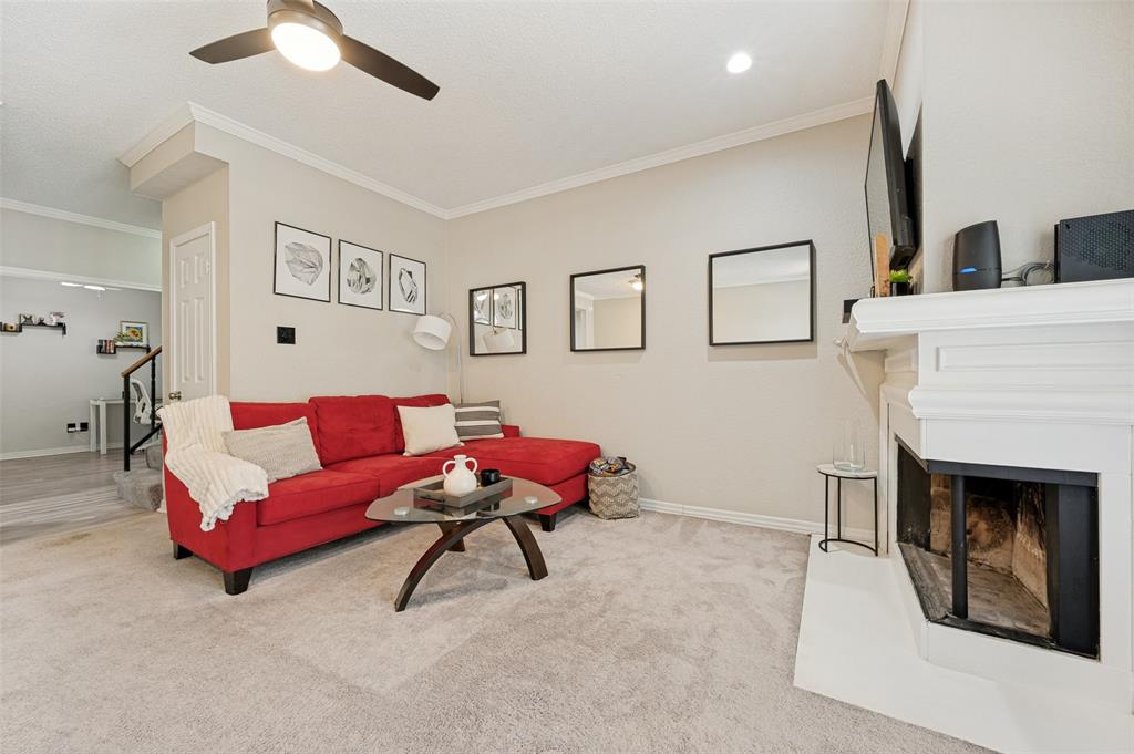 Tucked inside a gated community with mature trees, a beautiful pool, and clubhouse, this stunning 2-story condo offers a rare and unique floorplan just steps from The Clubs of Prestonwood. Located on the second floor, this home combines comfort, privacy, and convenience in one exceptional setting. Inside, character and charm are everywhere. The inviting living room features crown molding, an arched window, and a cozy wood-burning fireplace, creating the perfect space to unwind after a long day. Step onto the balcony and enjoy peaceful pool views, or gather with friends while cooking in the open updated kitchen that flows seamlessly into the family room and downstairs open study and an attached half bath. One of the home’s most unique features is the private third-floor entrance leading directly to the guest suite—ideal for visitors, roommates, or a private office setup. Guests will appreciate the privacy of the en-suite bath, while the spacious primary retreat feels like a private sanctuary—complete with vaulted ceilings, a second fireplace, a generous walk-in closet, and a spa-like en-suite bath. Perfectly positioned just minutes from the dining, shopping, and nightlife of Addison, with quick access to the Dallas North Tollway and both major airports, this condo delivers an unbeatable lifestyle and location. Even better—washer, dryer, and refrigerator are all included!