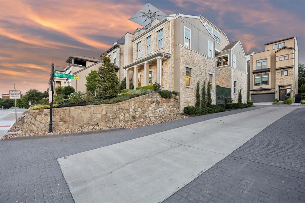 Discover the perfect balance of sophisticated design and effortless modern living. This gorgeous home is situated on a coveted corner lot in Kessler Park. This expansive 2,714-square-foot contemporary home is ideal for those seeking more space without the burden of heavy maintenance. Combining the security of a lock-and-leave lifestyle with premium upscale finishes, this residence offers a rare opportunity to capture a turnkey home in a highly connected urban setting.

Step inside to an atmosphere of refined luxury, where 11-foot ceilings and wide-plank hardwood floors are complemented by professional interior curation. The home boasts standout custom upgrades, including designer wallpapers by Cole & Son and Thibaut, high-end Foscarini lighting, automated shades, and integrated audio. Designed with an entertaining lifestyle in mind, the open-concept layout centers around a chef’s kitchen featuring ceiling-height cabinetry, extensive storage, and seamless flow into the living and dining areas. With three generously sized bedrooms, two full bathrooms, and two half-bath powder rooms, the floor plan maximizes comfort, privacy, and everyday functionality. The crown jewel of this property is the spectacular third-floor rooftop deck, offering breathtaking, unobstructed views of the downtown Dallas skyline, perfect for evening relaxation or impressive hosting. 

Located near the historic Stevens Park Golf Course and just minutes from the vibrant dining, boutique shopping, and culture of the Bishop Arts District, this location offers an unparalleled lifestyle. Commuters will appreciate the incredibly close proximity to downtown Dallas and major transit routes like I-30, making the daily drive effortless.