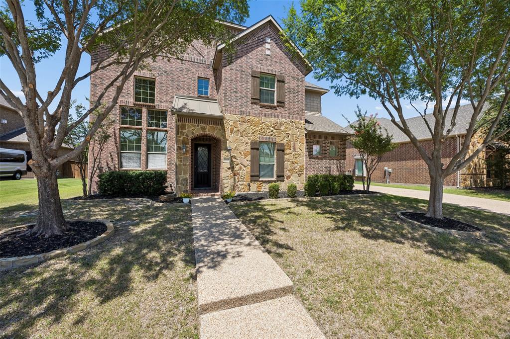 Nestled in the highly sought-after golf course community of Trophy Club, this beautifully appointed 5 bedroom, 4.5 bath home offers the perfect blend of luxury, comfort, and functionality. Built by Pulte with energy efficiency in mind, the home features soaring vaulted ceilings, hardwood flooring, extensive sound wiring, and elegant oil-rubbed bronze fixtures throughout. The gourmet island kitchen is designed for both everyday living and entertaining, showcasing granite countertops, knotty alder cabinetry, stainless steel appliances, double ovens, a walk-in pantry, and abundant prep space. The spacious primary suite offers a relaxing retreat with granite vanities, an oversized walk-in shower, corner garden tub, and an impressive walk-in closet. A private guest suite with its own full bath is conveniently located on the main level. Upstairs, enjoy a large game room and dedicated media room, providing endless opportunities for entertainment. The inviting family room is anchored by a stunning corner stone fireplace, while the oversized covered patio with gas hookup creates the perfect outdoor living space. Ideally located near award winning schools, parks, premier shopping, dining, convenient access to HWY 114, and all the amenities Trophy Club has to offer. Rarely does a home offering this combination of space, features, and location become available in Trophy Club. Don't miss your chance to make it yours!