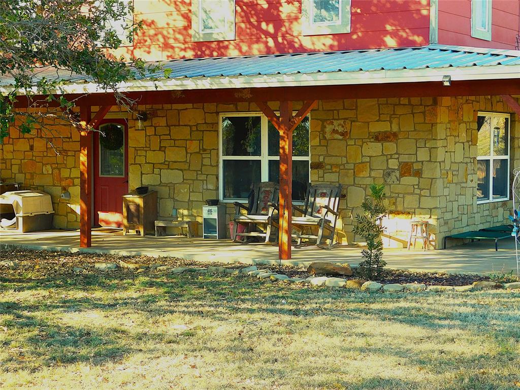 Come along to 9300 County Road 131 — a peaceful retreat at the very end of the road, offering privacy, space, and beautiful country living.
This charming 3-bedroom, 2.5-bath home features nearly 2,500 sq ft of living space and sits on just under 38 acres of land.
Inside, the primary suite is conveniently located on the first floor, complete with access to a multi-level deck—a perfect place to enjoy morning coffee or evening sunsets. The spacious eat-in kitchen and dining area provide plenty of room for family meals, and the inviting living room features a striking fireplace as its centerpiece.
Upstairs, you’ll find two additional bedrooms with a shared bathroom between them. The remainder of the second floor is an open bonus area, currently used as an office and craft space—ideal for a game room, hobby room, or whatever your imagination dreams up.
Outside, the property boasts a wrap-around porch spanning two sides of the home, a small fish pond in the front yard, and a large tank behind the shop. The metal workshop includes a concrete floor, electricity, and ample storage, making it perfect for projects, equipment, or tools. The land is currently home to goats, and the acreage is rich with wildlife, including Whitetail Deer, Dove, Turkey, Hogs, and Coyote—an excellent setup for hunting or simply enjoying nature.
If you're looking for peaceful country living with room to roam, this is a place you’ll want to see. Come take a look and make it yours.  There are three other tracts totaling approximately 112 acres available.