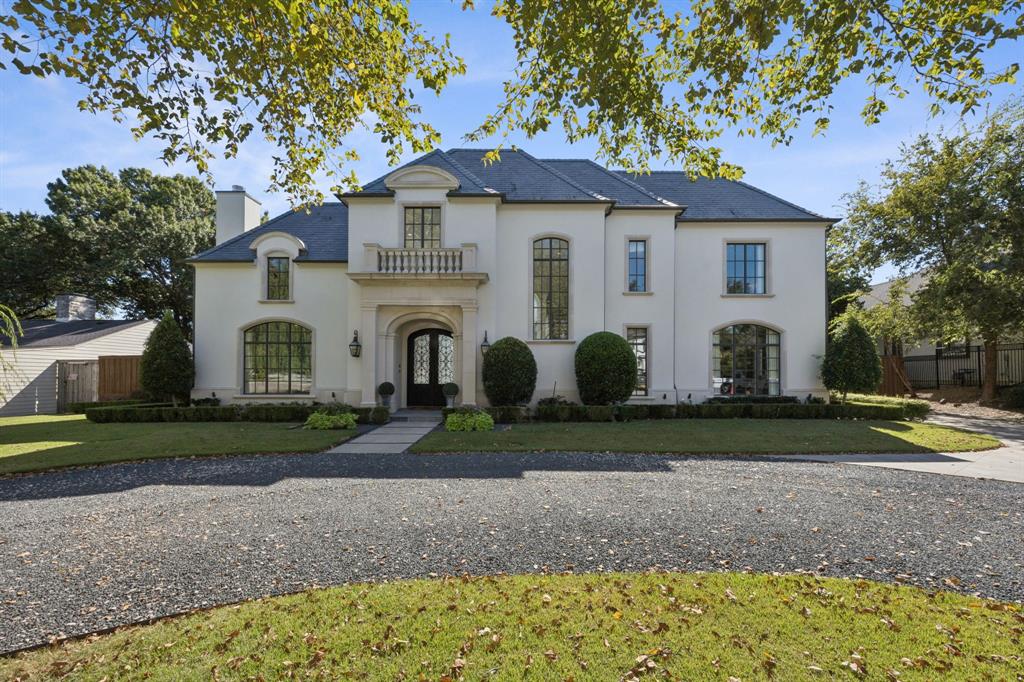 Exquisite custom home on over half an acre in the prestigious Manchester Downs neighborhood. Built in 2014, this 5,691 sq ft residence offers a refined blend of modern functionality and timeless design, featuring 4 spacious bedrooms, 6 full baths, and a powder bath. A separate 980 sq ft detached library with full bath provides ultimate flexibility for remote work and could easily be reworked as living quarters.

Thoughtfully designed interiors include multiple living and dining areas, rich hardwood and marble flooring, detailed millwork, and curated lighting. The gourmet kitchen is outfitted with Sub-Zero, Wolf, and Bosch appliances, custom cabinetry, and a generous island suited for entertaining. The primary suite on the main floor offers privacy and luxury with spa-style amenities, while upstairs hosts three additional bedrooms and a gameroom or media space.

Outdoor living is elevated with a covered patio, built-in grill, misting system, and a heated pool surrounded by lush landscaping. Recent upgrades include four new Trane HVAC units (2023–2025) and Control4 smart home automation. A circular drive, 3-car garage, and gated fencing complete the property’s exceptional exterior features.

Located near top private schools, shopping, and dining.