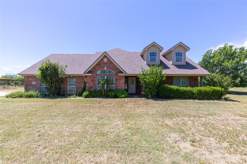 Offering a $5,000 allowance. Discover the perfect blend of space, comfort, and versatility in this 4-bedroom, 2.5-bath home tucked away on a quiet cul-de-sac. Situated on a sprawling 1-acre lot, this property offers the privacy and room to roam that are hard to find while still being conveniently located near town amenities. Inside, you’ll love the functional layout designed for both everyday living and entertaining. The spacious primary suite is located on the first floor, creating a private retreat separate from the additional bedrooms. Upstairs, the oversized fourth bedroom offers endless possibilities and could easily be transformed into a second living area, game room, media room, home office, or flex space to fit your lifestyle. This home has been thoughtfully updated with major improvements already completed, including a roof that is only four years old and an AC unit replaced in 2021, giving buyers added peace of mind. Whether you’re hosting gatherings, enjoying quiet evenings under the Texas sky, or simply appreciating the extra elbow room that comes with an acre of land, this property delivers the ideal combination of comfort, functionality, and charm.