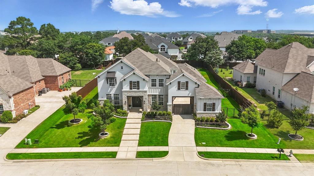 Welcome to this exquisite 5,028 sq ft estate, built in 2017 by Toll Brothers and nestled in one of Southlake’s most coveted neighborhoods. Perfectly blending elegance, comfort, and functionality, this 5-bedroom, 6-bathroom masterpiece offers refined living just minutes from premier amenities. Step inside to discover soaring ceilings, a private office, game room, and media room—all thoughtfully designed for today’s lifestyle. The gourmet eat-in kitchen is a chef’s dream, boasting stunning quartz countertops, abundant cabinetry, top-of-the-line JennAir appliances, a double oven, and an expansive island that anchors the space beautifully. Retreat to the showstopping backyard oasis featuring a custom Claffey pool with spa and entertain year-round in the custom outdoor living area complete with fireplace, built-in grill, outdoor heaters, motorized shade screens, and luxurious granite waterfall counters. Situated on a nearly .5 acre lot, this home offers both space and privacy, all within walking distance to the exclusive Westlake and LifeTime Fitness. Zoned to highly acclaimed Carroll ISD. 
This is Southlake luxury at its finest—schedule your private tour today!