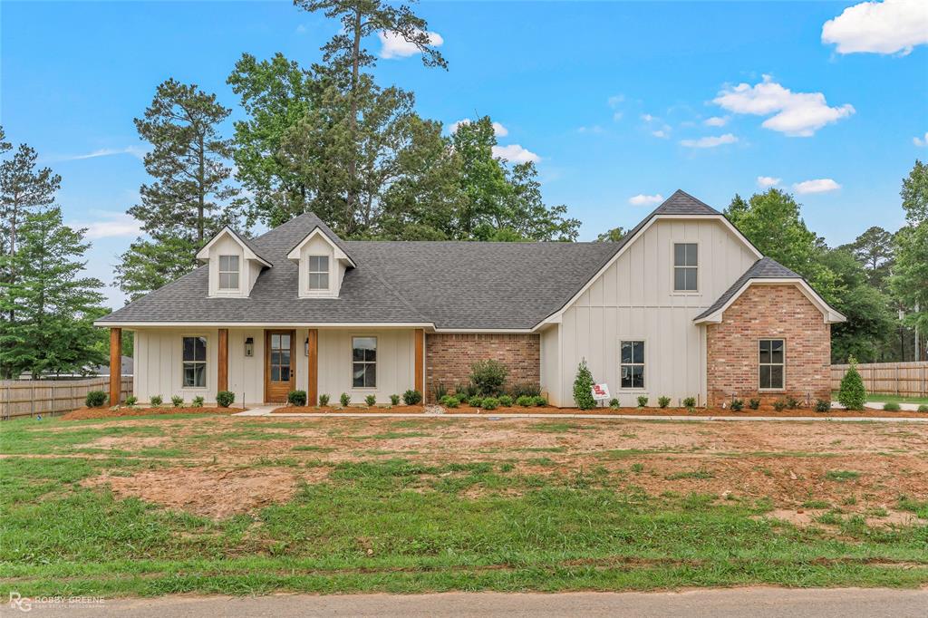 Welcome to your dream home in the highly sought-after Cornerstone Subdivision—where style, comfort, and convenience come together perfectly for first-time homebuyers and growing families alike. This stunning new construction is ideally located with easy access to Shreveport, Bossier City, and Barksdale Air Force Base (BAFB).

Thoughtfully designed for modern living, this beautiful single-story home features 4 spacious bedrooms and 3 full bathrooms, including a luxurious primary suite that offers the perfect private retreat. The open-concept floor plan is enhanced by soaring 11-foot ceilings, creating a bright and airy living space that seamlessly connects the kitchen, dining, and living areas—ideal for entertaining or everyday family life.

Enjoy high-end finishes throughout, including gorgeous ceramic tile flooring in all main living areas and custom cabinetry in both the kitchen and bathrooms. Step outside to the large covered back patio, perfect for relaxing evenings, outdoor dining, or weekend gatherings.

The spacious three-car garage provides plenty of room for vehicles, storage, or a workshop area. Conveniently located just minutes from I-20 and Hwy 80, this home offers the tranquility of suburban living while keeping you close to shopping, dining, and local amenities.

Don’t miss your opportunity to own this beautiful move-in-ready home designed with today’s lifestyle in mind. Schedule your private showing today!