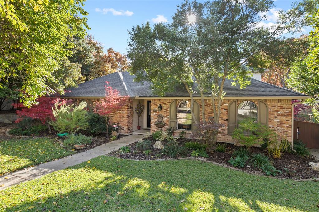 Welcome Home to this incredibly charming 4 bedroom home nestled on an oversized cul de sac lot & situated in the heart of Dallas! Thoughtfully designed with functionality in mind, offering an elegant dining area with enough room for those large Holiday gatherings----while the open, airy living room radiates comfort & spaciousness that creates the perfect setting for everyday living & entertaining! Lots of natural light throughout the living room highlighting the vaulted wood beamed ceiling, a rustic floor to ceiling brick fireplace with custom built-ins, rich hardwoods, and a wet bar that makes a great showpiece when hosting! The eat-in kitchen comes equipped with a beverage cooler & a double gas oven. Primary bedroom, 2 additional bedrooms, and full bathroom are on the main level. There is also a study, 4th bedroom & an ensuite bath on the second level! Three storage buildings. NO HOA! Quick access to an array of entertainment & an eclectic blend of restaurants & trendy hot spots!