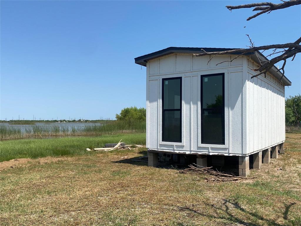 Two prime waterfront lots on Lake Stamford offering privacy, scenery, and endless potential. This property includes a fenced area and a one-bedroom tiny home featuring a built-in kitchen and bathroom. The tiny home still needs to be finished out, giving buyers the chance to customize it to their needs.
Utilities are not yet connected; electricity is available, water is run to the unit, and sewer will need to be added.
Enjoy beautiful lake views and peaceful surroundings—ideal for a weekend retreat, rental opportunity, or future build. A fantastic location with room to grow and make it your own. Buyer to verify all information.