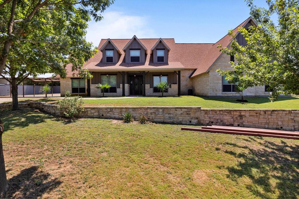 Welcome to 402 N Parkway Drive, Alvarado, Texas 76009—5 Bedrooms 3.5 Baths and over 4900 sqft. Look at this luxurious retreat nestled on 10+ acres in Johnson County! This fully remodeled luxury home is move-in ready, offering unparalleled elegance and comfort. Featuring spacious living areas, a state-of-the-art kitchen, and high-end finishes throughout, this property is designed for sophisticated ranch life style living. Outside, you'll find well-maintained stables, an extended 3-car carport perfect for an RV or boat, and secure pipe fencing with an electric gate entrance, providing both convenience and peace of mind. Attached an oversized attached 3 garage. Inside, enjoy the expansive game room and media room, perfect for entertaining family and friends. Experience the best of country living with modern amenities in this exceptional property. Don't miss the chance to make this exquisite home your own.