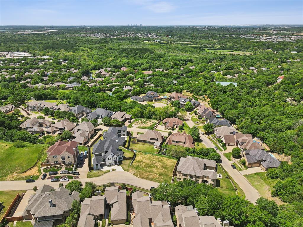 Welcome to Sunset Hills, an exclusive gated community where luxury meets convenience. This oversized 0.349-acre lot sits on one of the highest elevations in the neighborhood, offering breathtaking sunset views that stretch all the way to the Fort Worth skyline!
Nestled among custom homes, this intimate, ready-to-build homesite provides the perfect blend of privacy and accessibility. Enjoy being just minutes from Texas Live!, AT&T Stadium, Globe Life Field, and I-30—placing you at the center of premier entertainment and easy commuting. 
Don’t miss the opportunity to bring your dream home to life in this prestigious and scenic setting.