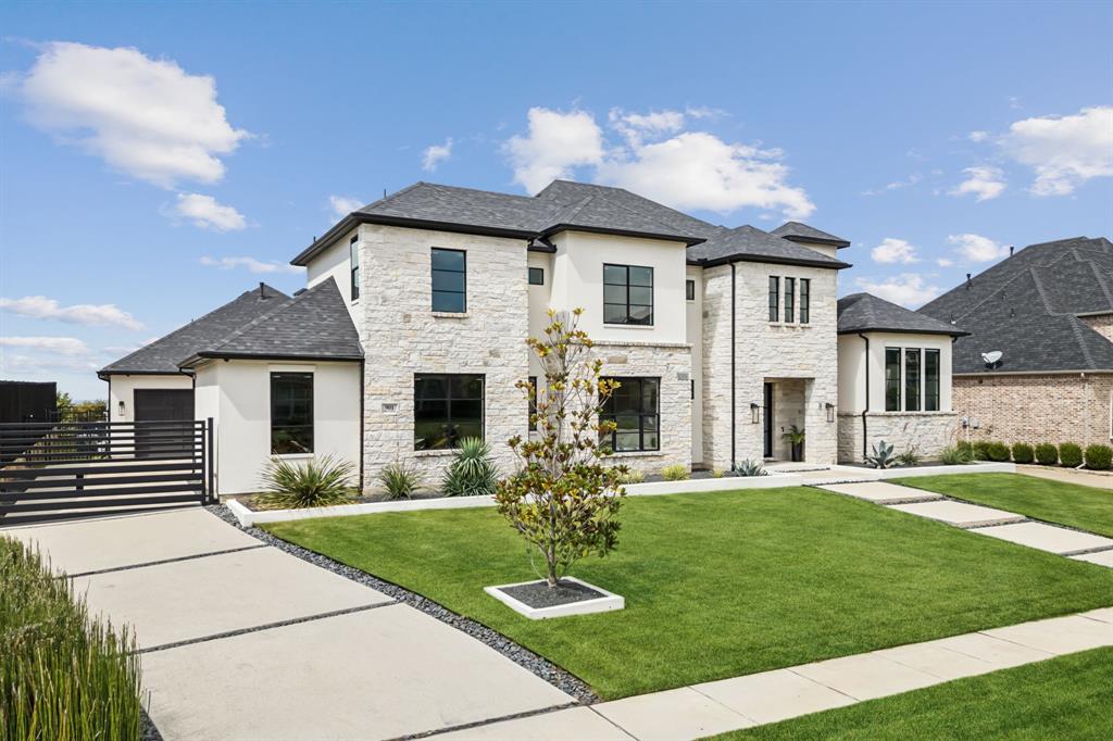 SPECTACULAR CUSTOM DESIGNED TRANSITIONAL-MODERN HOME in Prosper, Texas.
This masterpiece boasts a soaring entry with a glass enclosed wine room, dream kitchen, stunning living areas, a primary suite you won’t want to leave, resort style patio, large saltwater swimming pool, theater, game room, and a motor court with 5 garage spaces.
The media room is a work of art, and the main living room features a 72” wide Montego Linear Fireplace, wood beams and 16’ wide sliding doors, that open to the large patio, pool, outdoor kitchen and backyard with beautiful views. Kitchen features an 11’ Mont Blanc Quartzite waterfall island & Quartzite countertops, a Thermador built-in refrigerator & freezer, Miele built-in plumbed coffee machine, and stunning custom lighted cabinetry. The primary suite features a beautiful view of the pool, electric privacy shades, two walk-in closets, floating vanities, soaking tub & stunning walk in shower. 
Must see online feature information and cinematic video.