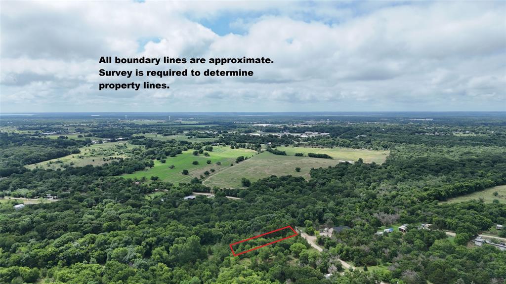 No Known Restrictions. Half acre (+ or -) lot outside the city limits. Property is heavily wooded. Mobile Homes allowed. Property will require aerobic septic. Cash Water and Farmers Electric are utility providers. Boundary lines on photos are approximate. Survey required to determine property lines. Seller will consider all offers. Buyer responsible for new survey.