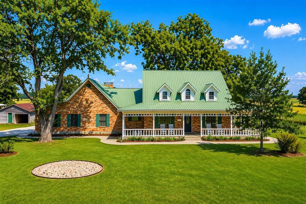 Endless possibilities await on this exceptional 26.21-acre farmstead in Rains ISD! Perfect for multi generational living, a hobby farm, or income production. The 2,362 sq. ft. home features 4 beds, 2.5 baths, a split floor plan, dual floor-to-ceiling fireplaces, and a wrap-around porch. The kitchen boasts double ovens and stainless appliances, while the primary suite offers a jetted tub and walk-in closet.

Currently an income-producing dairy farm on sandy loam soil, the property is fully fenced and cross-fenced with multiple pastures, pens, a large pond, and 2 huge producing pecan trees. A massive shop features a commercial kitchen setup, half bath, and Washer dryer hookups—easily convertible to an ADU by adding a shower!

Prime location: Just 15 mins to two of the nation's best tournament fishing lakes and 20 mins to Canton's famous trade days. A rare, versatile property ready for your vision!
