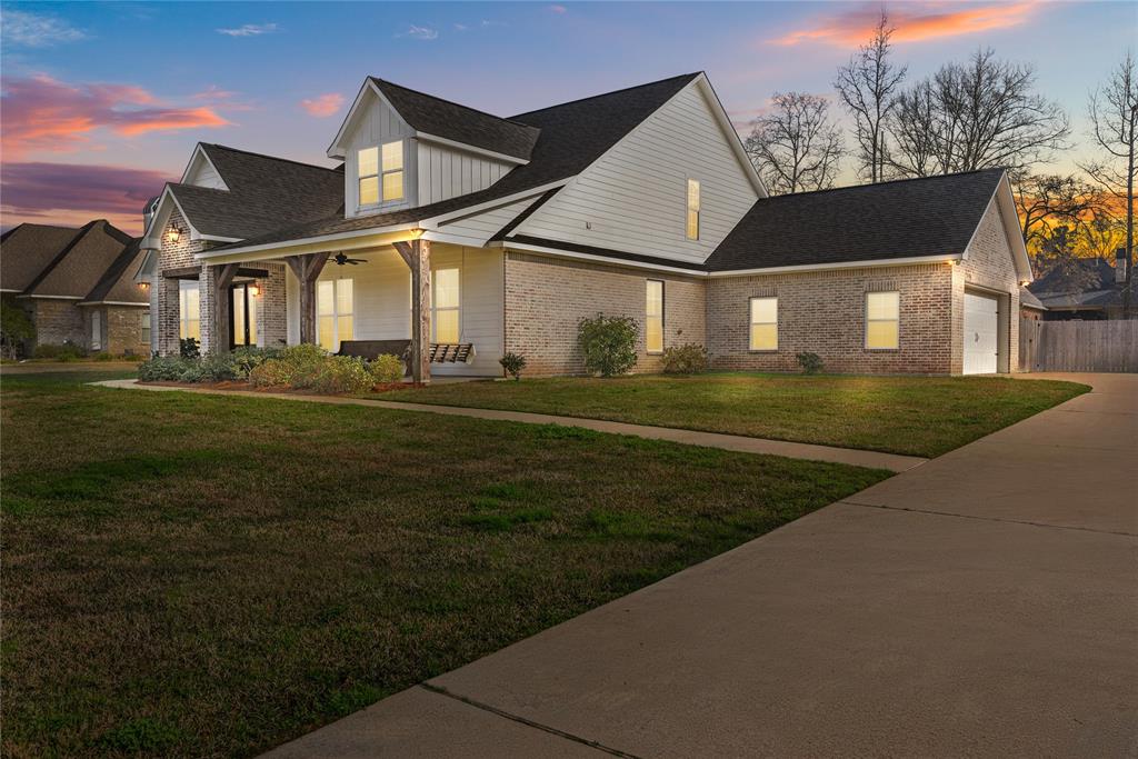 Step into a home that is truly one of a kind, where architectural drama meets everyday functionality.

This 4 bedroom, 3.5 bath beauty also features a spacious bonus room that could easily serve as a 5th bedroom, office, or media space. The moment you walk in, you’re greeted by soaring 22-foot ceilings in the living room and a stunning spiral staircase that leads upstairs, a show-stopping focal point you won’t find just anywhere.

The living room and kitchen are thoughtfully connected by a double-sided gas-burning fireplace, creating warmth and character in both spaces. The kitchen offers gas appliances, a farmhouse sink, ample counter space, abundant cabinetry, and a remodeled pantry designed for maximum efficiency.

The primary suite is a retreat of its own, featuring an ensuite bath, a walk-in closet with vanity, and direct access into the laundry room, complete with added shelving for organization and convenience.

Upstairs, the bonus room features new LVP flooring, while the garage has been upgraded with custom flooring and a full shelving-organization system.

Situated on over half an acre, the backyard offers endless possibilities with plenty of room to roam, a concrete walking path, and a septic sprinkler system that can be alternated between the front and backyard.

With oversized parking, thoughtful upgrades throughout, and a design that stands apart from the rest. This home is anything but ordinary.