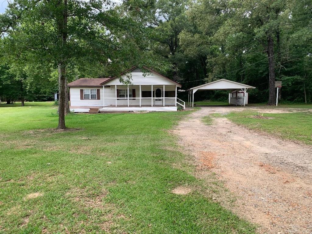 Nice ranch style home in Doyline on 2.43 acres.  Great location with room for animals.  Very spacious home with large covered front porch and detached 2 car carport.  Large garden spot with separate water well for garden and livestock use.  Storage building in side yard.  Seller is reserving mineral rights.