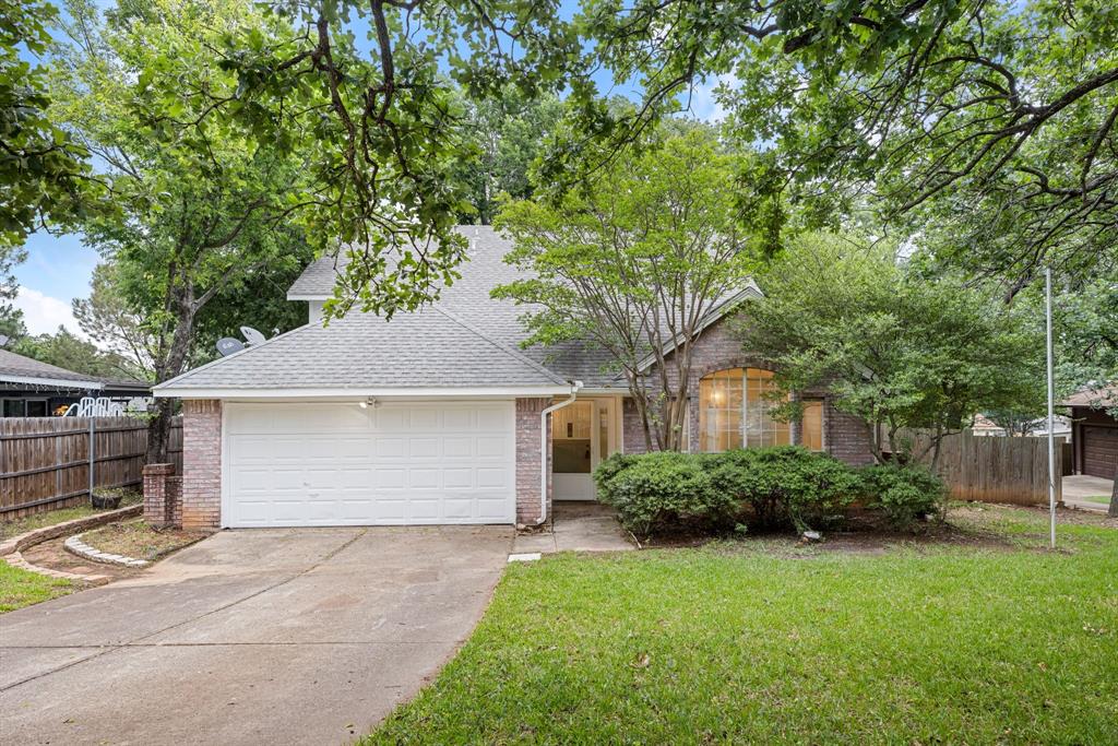 Nestled on a quiet cul-de-sac beneath a canopy of towering oak trees, this beautifully updated Bedford home offers the lifestyle today's buyers are searching for.

With 3 bedrooms, 2.5 baths, two spacious living areas, and 1,716 square feet, this home combines comfort, character, and convenience. Soaring vaulted ceilings and abundant natural light create an inviting atmosphere, while fresh paint, updated flooring, granite countertops, and modern fixtures provide a move-in-ready feel throughout.

The kitchen offers granite countertops, ample storage, and an adjoining breakfast area overlooking the backyard. Granite countertops continue throughout the bathrooms, and the thoughtful layout is ideal for both everyday living and entertaining. The living room centers around a cozy brick fireplace, creating a warm gathering space for family and friends.

Step outside to a large backyard shaded by mature trees and an elevated patio that's perfect for morning coffee, weekend barbecues, or simply enjoying the peaceful surroundings.

Located in one of Bedford's most established neighborhoods, this home offers a rare combination of mature tree-lined surroundings and newer construction, having been built approximately a decade later than many of the surrounding homes. Enjoy easy access to miles of walking and jogging trails, parks, playgrounds, the new H-E-B, and highly regarded Meadow Creek Elementary.

Move-in ready and ideally located, this is the Bedford lifestyle buyers have been waiting for. Be sure to check out the video walkthrough available on YouTube for a closer look at everything this home has to offer.