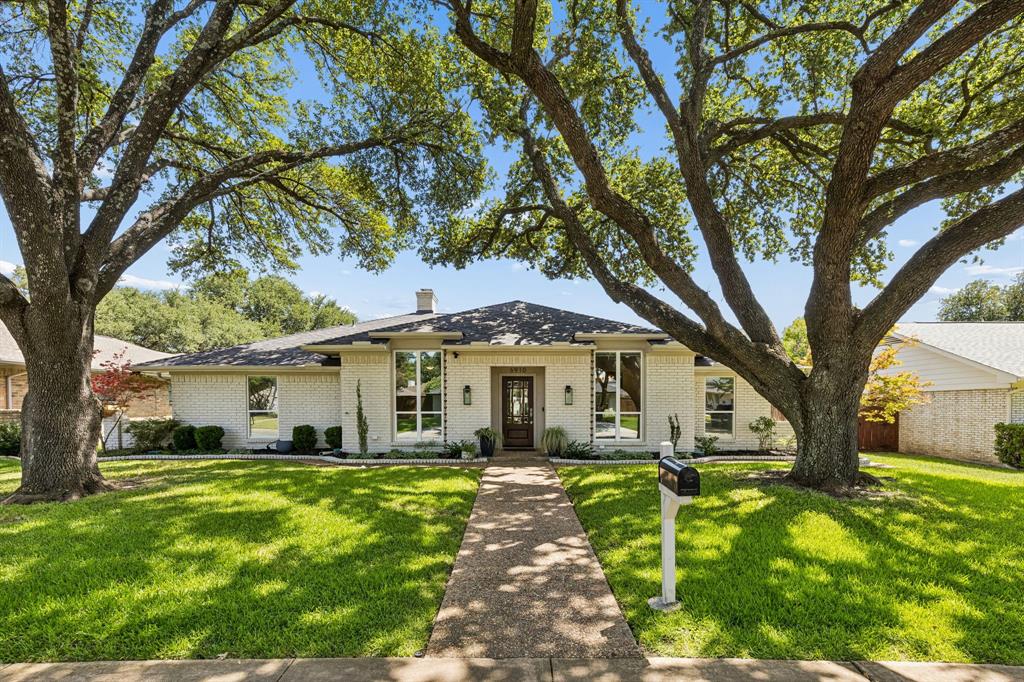 Nestled in the heart of Prestonwood, this beautifully remodeled ranch is everything you've been waiting for. Towering mature trees and exceptional curb appeal create a stunning first impression and welcome you home. Designed with both entertaining and everyday living in mind, the open-concept floorplan centers around a spectacular kitchen featuring an oversized island that overlooks the spacious living room. This space features a cozy gas log fireplace, custom built-ins, and floor-to-ceiling windows offering picturesque views of the backyard. A second living area provides incredible flexibility as a home office, playroom, media room, or teen retreat and features an attached full bathroom for guests. The private primary suite is a true sanctuary, complete with a luxurious ensuite bath, two oversized walk-in closets, and a generous sitting area. Two additional bedrooms are connected by a light-filled Jack-and-Jill bathroom, creating the perfect layout for family or guests. The backyard is an entertainer's dream. A covered outdoor living area beneath a beautiful pergola overlooks lush landscaping and a built-in fire pit, creating the perfect setting for relaxing or gathering with friends. The fully equipped outdoor kitchen includes a Green Egg smoker, gas grill, and refrigerator, all of which convey with the home. In addition to the attached two-car garage, a detached one-car garage offers endless possibilities. Whether you need extra storage, a workshop, home gym, or a private detached office, this versatile space is ready to fit your lifestyle. Move-in ready and exceptionally maintained, the home features an impact resistant and high profile shingle roof installed in 2023, providing both peace of mind and potential insurance savings. Located within the highly sought-after Brentfield Elementary, Parkhill, and J.J. Pearce attendance zone, this exceptional home offers the perfect combination of style, comfort, and location. SHOWINGS START FRIDAY JULY 24
