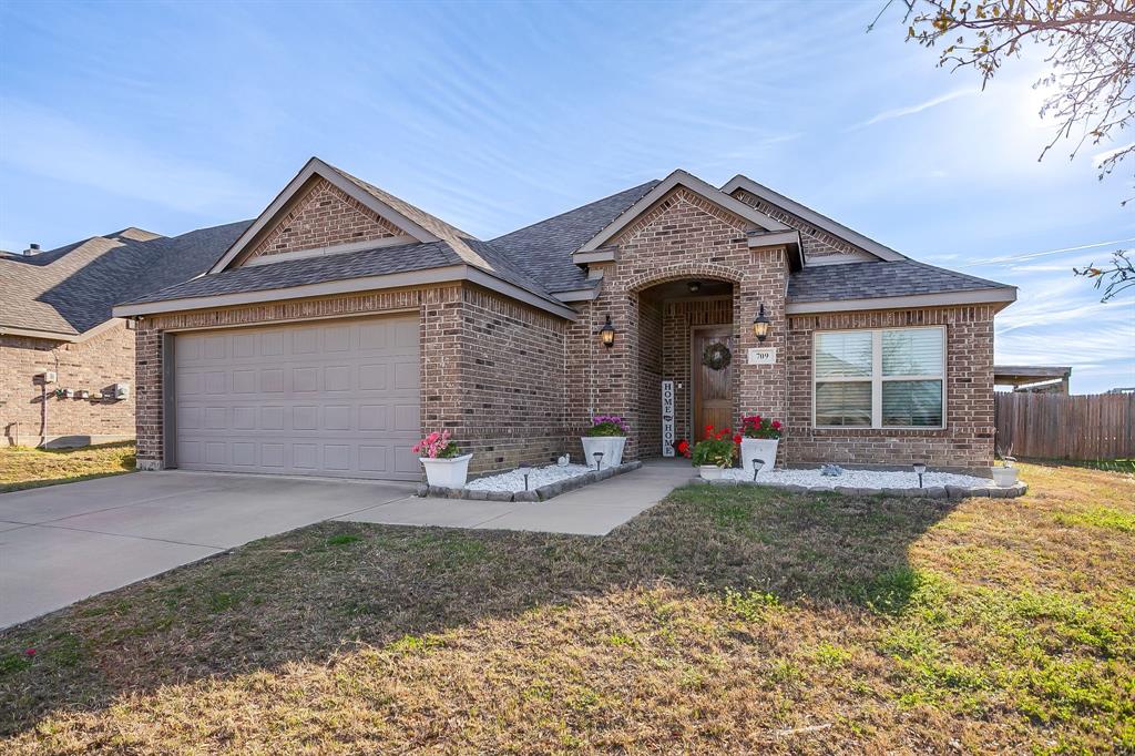 Beautiful custom home built by John Houston Homes located in highly sought-after Joshua ISD. This 3-bedroom, 2-bath home also features a dedicated office with a closet that can easily function as a 4th bedroom, offering flexible living options. The open-concept floorplan provides seamless flow between the living, dining, and kitchen areas—ideal for everyday living and entertaining. Step outside to an outdoor entertainer’s dream space, perfect for hosting gatherings or relaxing year-round. This home has Solar Panels that will be paid off at closing so enjoy a home with minimal bills!!  Custom details, functional layout, and desirable location make this home a must-see.
