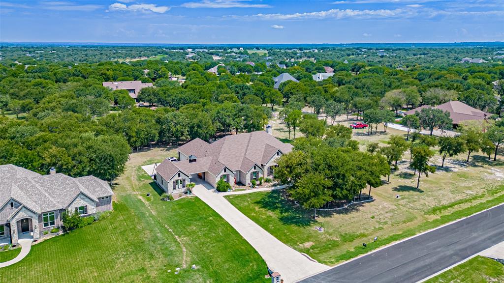 Welcome to Sugar Tree Golf Course!  This property offers so many amazing amenities!  An 18- Hole Golf Course that settles along the Brazos River in Lipan Texas!  The Golf Course Club House offers a place to sit and eat during your golf play and golf store to provide all the golf necessities!  The neighborhood and Golf Course has lots of wildlife with surrounding pond areas and its very common to see Deer throughout all these ground areas!  This home is about location and having a family oasis, that can entertain your family and guests!  Enjoy the community clubhouse that provides a nice cool swimming pool in the spring and summer and a gym room for exercising and pavilion for entertaining and hosting barbeques or parties!  The Brazos River has beautiful sights and scenery that make great photos of the western sunset skyline! This home is large enough with plenty of room to accommodate your family and extended family members!  Make the drive and see your family living here!