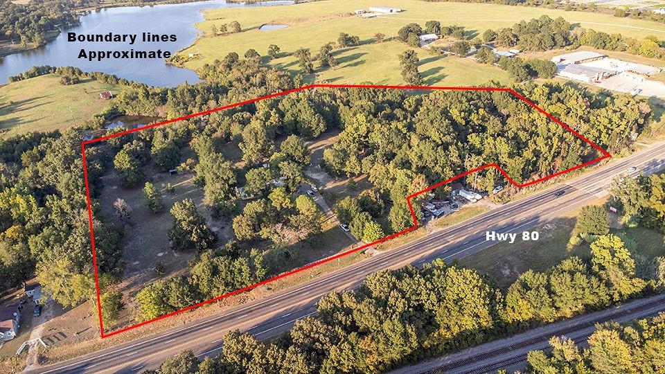 Amazing Opportunity – Country Estate on 10.5± Acres! Don’t miss your chance to own this beautifully maintained country home, featuring 4 spacious bedrooms and 2 well-appointed baths, perfectly situated on 10.5± acres along US Hwy 80E, right at the edge of Grand Saline. This property combines the peace and privacy of country living with unbeatable access to town amenities. With no restrictions, the possibilities are endless—ideal for anyone looking to start a new venture, expand an existing business, or simply enjoy the freedom of rural living. The property’s prime highway frontage offers excellent visibility and accessibility, making it a rare find for entrepreneurs or families seeking both home and business potential in one location. The land is fully fenced and cross-fenced, making it livestock-ready and currently benefiting from a livestock exemption—perfect for cattle, horses, or other animals. Wide-open pastures, mature trees, and plenty of space create an inviting setting with room to grow. This home has been meticulously cared for, offering comfort, functionality, and long-term value. Whether you’re dreaming of running a business from home, building a family farm, or simply enjoying the wide-open spaces, this property delivers. Enjoy the best of both worlds: serene country living with the convenience of being just minutes from town. This is more than a home—it’s an opportunity. Schedule your showing today before it’s gone!