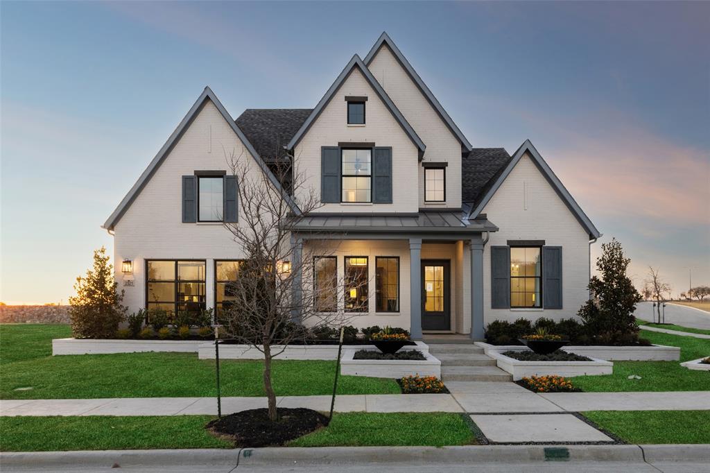 SOUTHGATE HOMES MADISON II floor plan.  The wait is over! Highly anticipated model home is now available in July. This award-winning floorplan offers 4,190 sf of professionally designed living space, with every finish selected by our premier design firm to create a home that feels elevated while still warm & inviting. Blending modern farmhouse architecture with clean, contemporary finishes, the painted brick exterior, cedar accents & striking black windows create a timeless 1st impression. Soaring ceilings, expansive walls of glass, designer lighting, rich wood flooring & layered architectural details give the home a true custom feel. The family room is the centerpiece of the home, featuring vaulted ceilings highlighted by cedar beams, a Calacatta Gold quartz slab fireplace surround + full wall of windows that flood the space with natural light. A 15-foot sliding glass door seamlessly connects indoor living space to the private outdoor retreat. Dining nook features built-in bench seating & its own 9-foot sliding glass door overlooking the backyard. Dark cabinetry + designer lighting throughout the kitchen & living spaces create a sophisticated atmosphere that feels comfortable & livable. Designed for entertaining, the home also includes a downstairs wet bar with sink, upstairs dry bar, dedicated media room, private study, spacious game room with paneled ceiling detail + five generously sized bedrooms. The first-floor primary suite offers cedar beam accents, custom wall detailing, stained cabinetry, a freestanding soaking tub, walkthrough shower, and sizable walk-in closet. A second bedroom downstairs adds flexibility for visitors or multigenerational living. Outside, the backyard comes complete with covered outdoor living, a modern firepit gathering area & eight trees lining the fence that will provide both privacy & shade for years to come. Appliances, drapery, drapery hardware, and TVs (excluding those in the sales office) are included in the sale of the home.