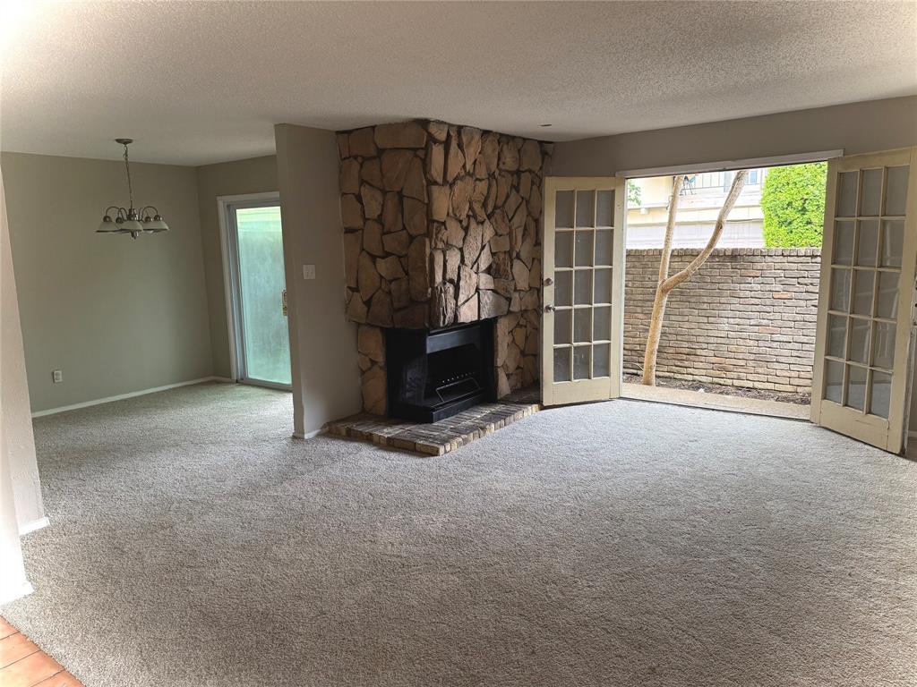 Perfect an Investor or first-time buyer! Welcome to the gated community of Park Lane Place. This ground floor 3 bed, 2 bath condo is ready for a new owner's final touches. The unit has and open floor plan with plenty of natural light in every room! Recent updates include new carpet in bedrooms, fresh paint throughout and new kitchen countertops. The primary bedroom has a walk-in closet and full ensuite bathroom. The additional bedrooms can be used as an office or guest rooms. There is a gorgeous corner built-in wood burning fireplace in the living room with french doors leading out to a large private patio area that extends around the side. There is also a secondary patio entrance through the eat in dining area. Come see this amazing condo! Conveniently located near major highways, shopping and dining. Motivated Sellers Bring your offers! Condo is being sold As-Is. Owners are unable to make any additional repairs.